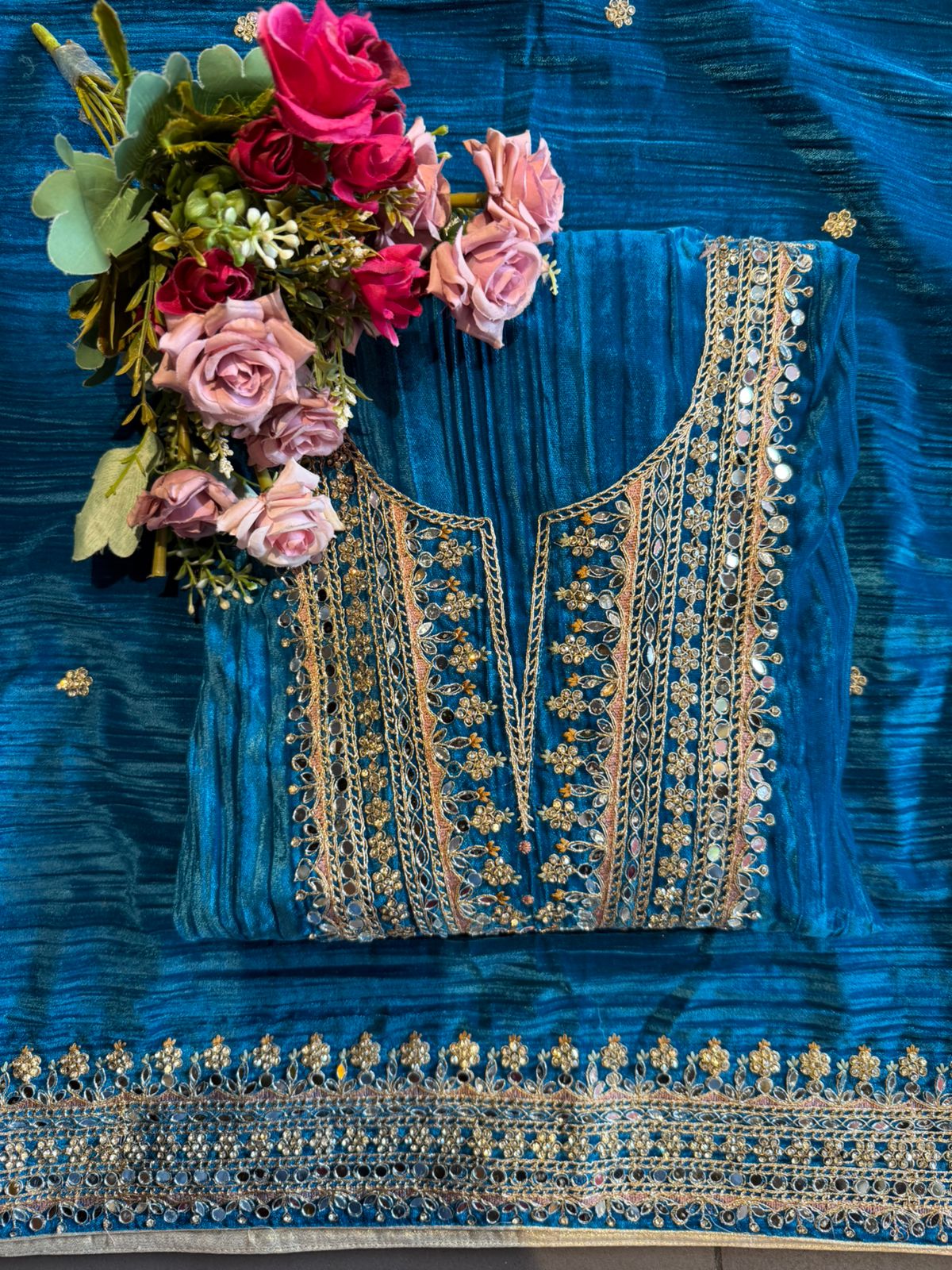 Heavily hand-worked velvet suit