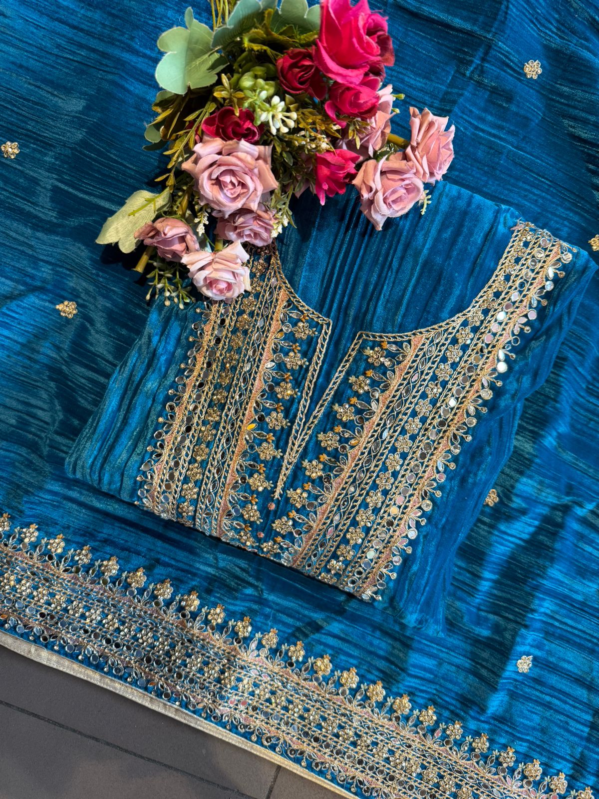 Heavily hand-worked velvet suit
