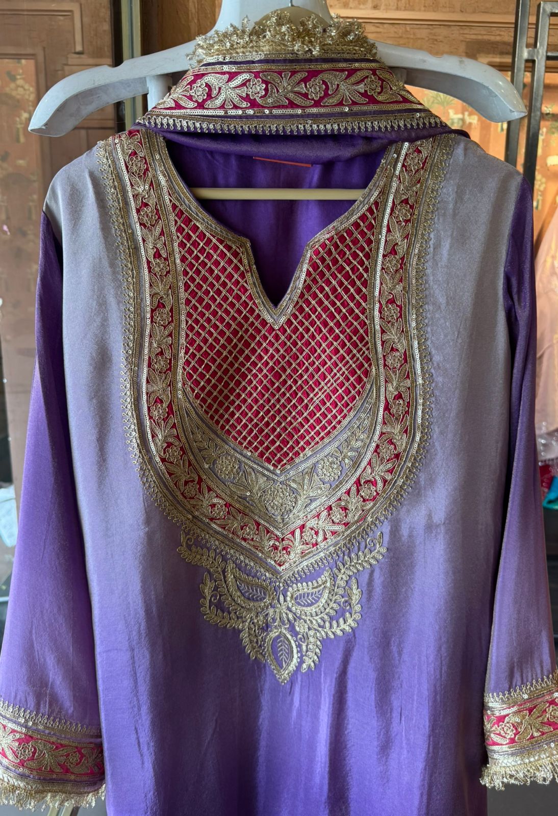 Traditional suit with heavy embellishment