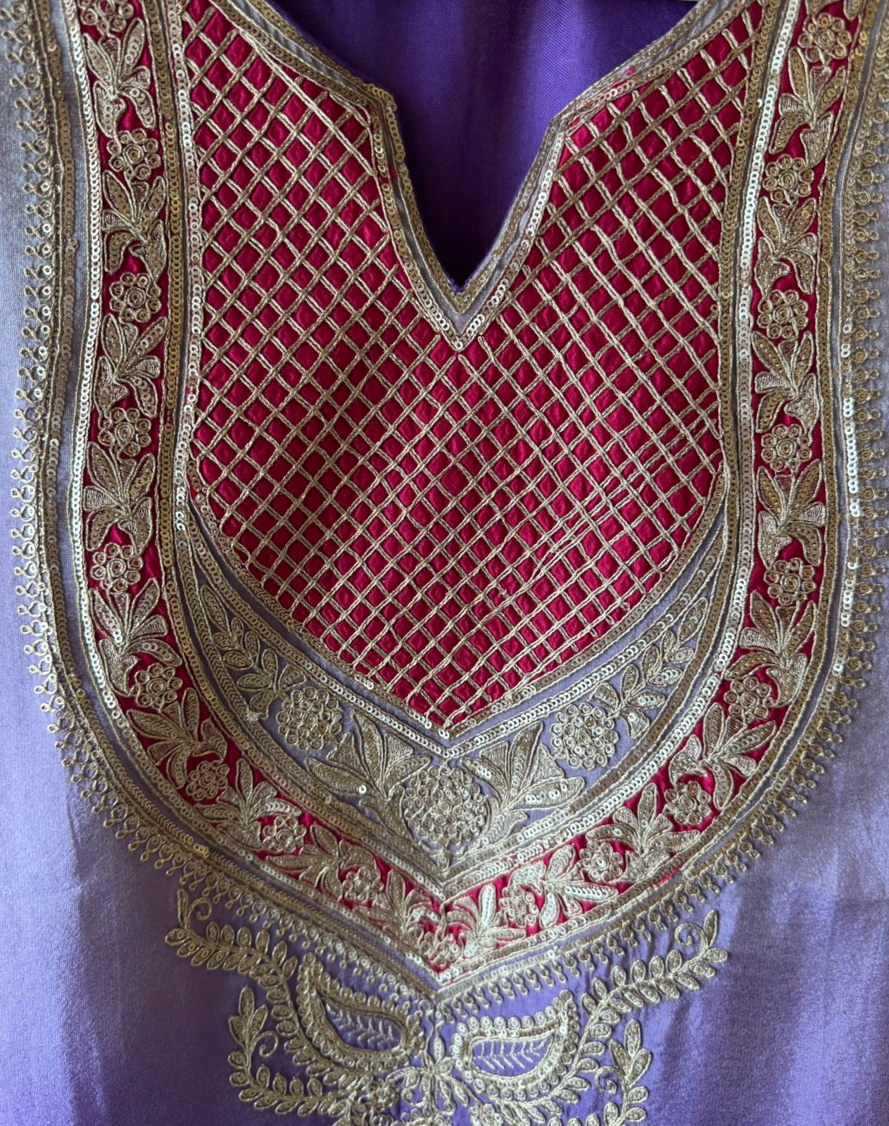 Traditional suit with heavy embellishment