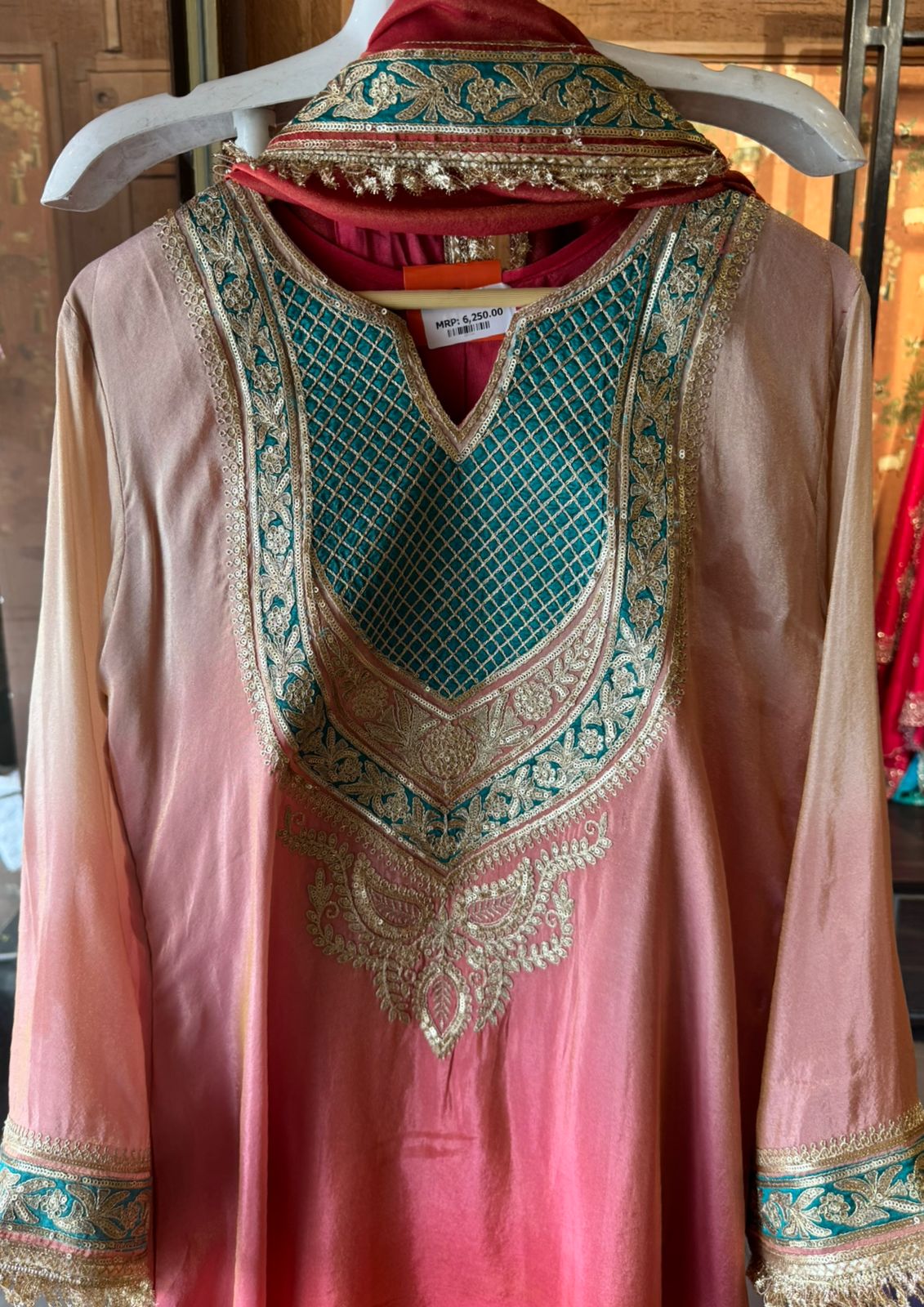Traditional suit with heavy embellishment