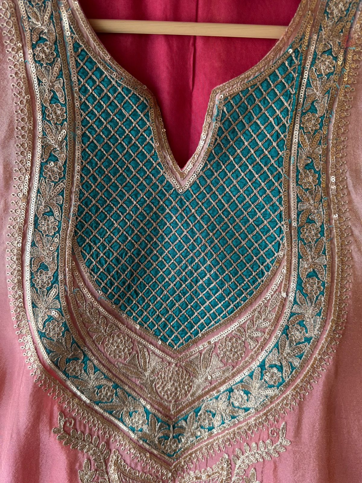 Traditional suit with heavy embellishment