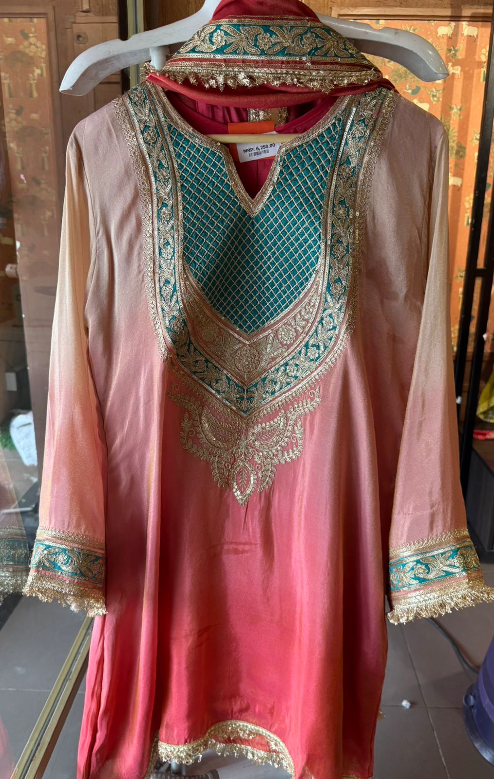 Traditional suit with heavy embellishment
