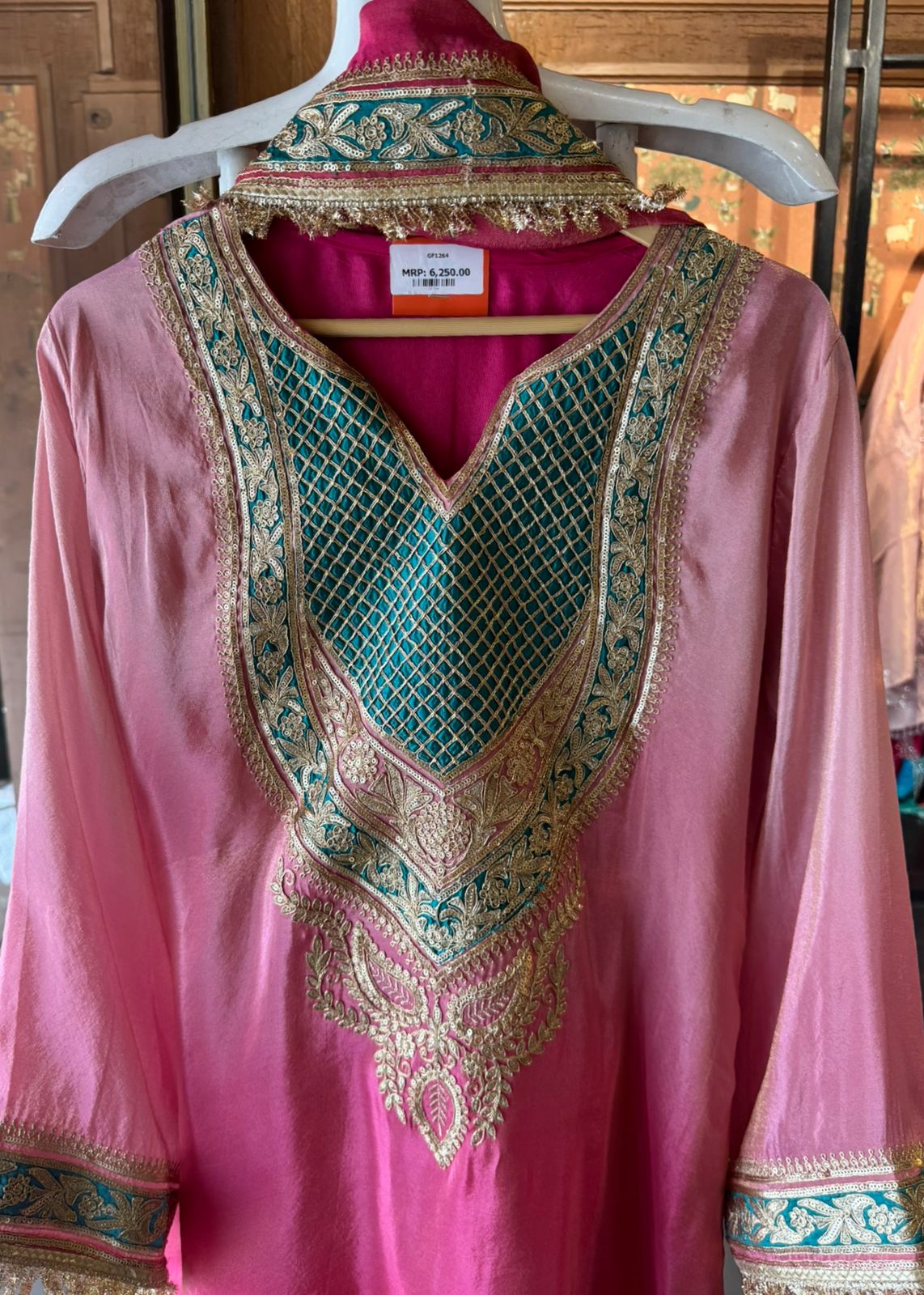 Traditional suit with heavy embellishment