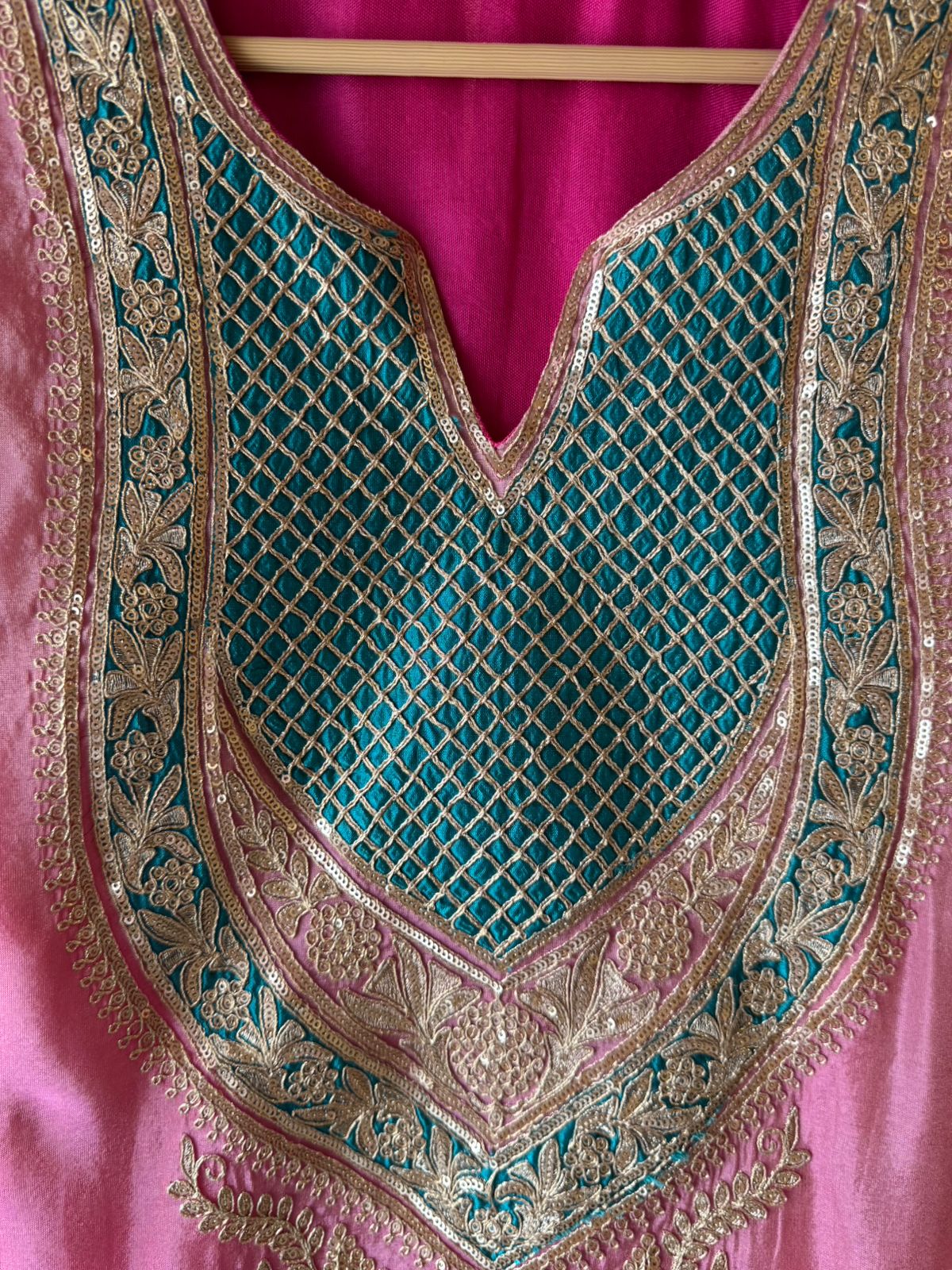 Traditional suit with heavy embellishment