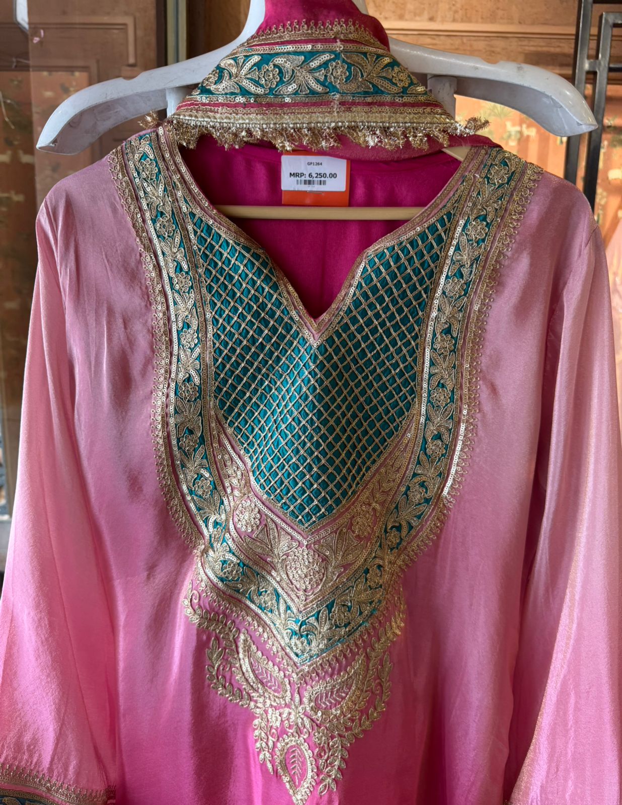 Traditional suit with heavy embellishment