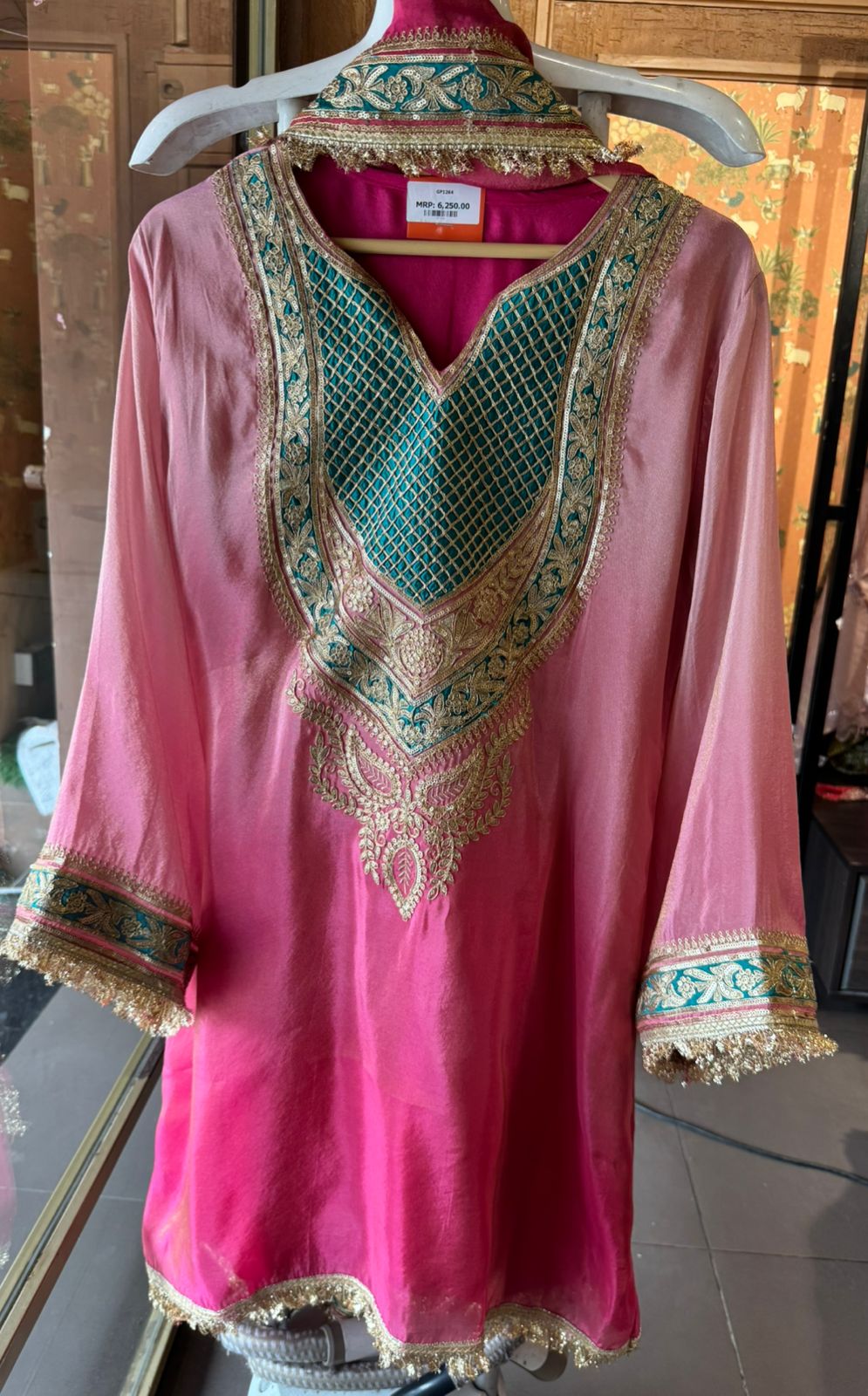 Traditional suit with heavy embellishment