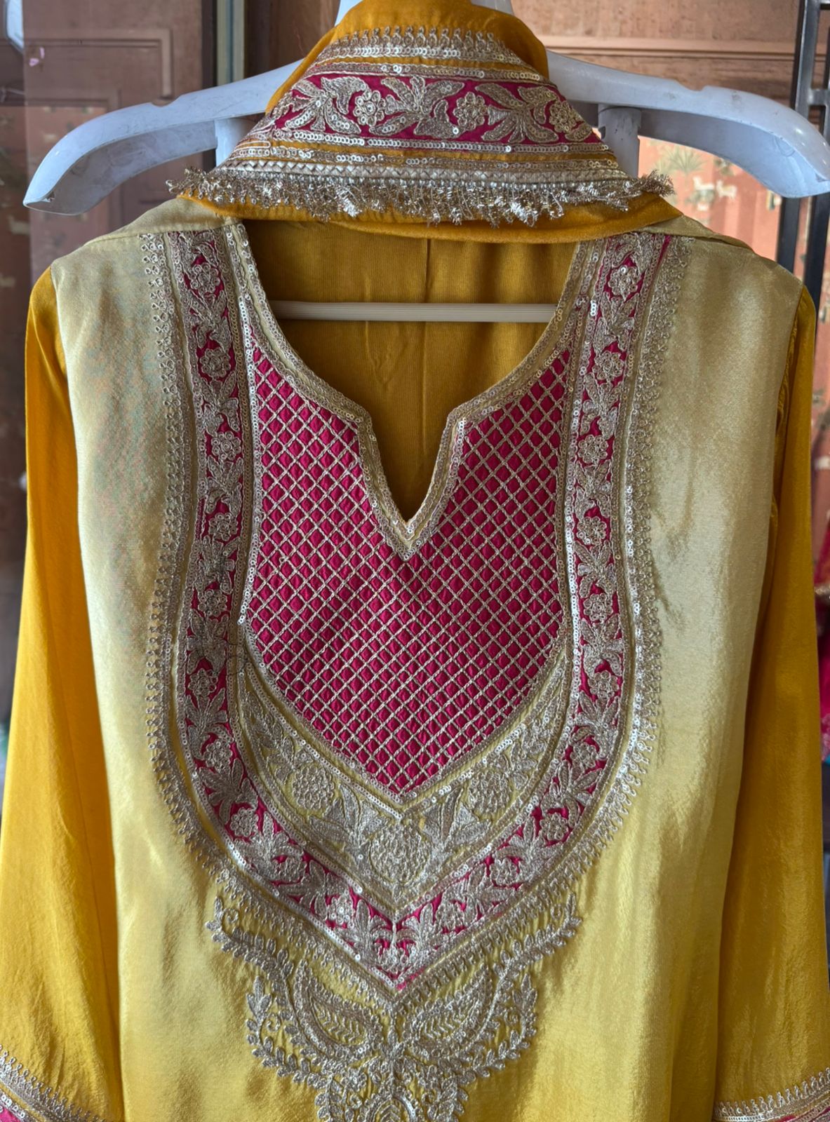 Traditional suit with heavy embellishment