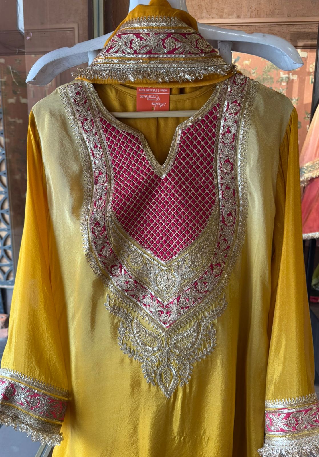 Traditional suit with heavy embellishment