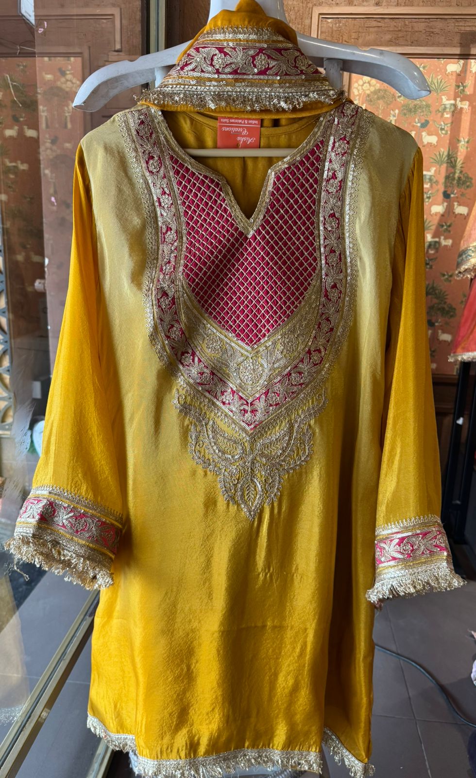 Traditional suit with heavy embellishment