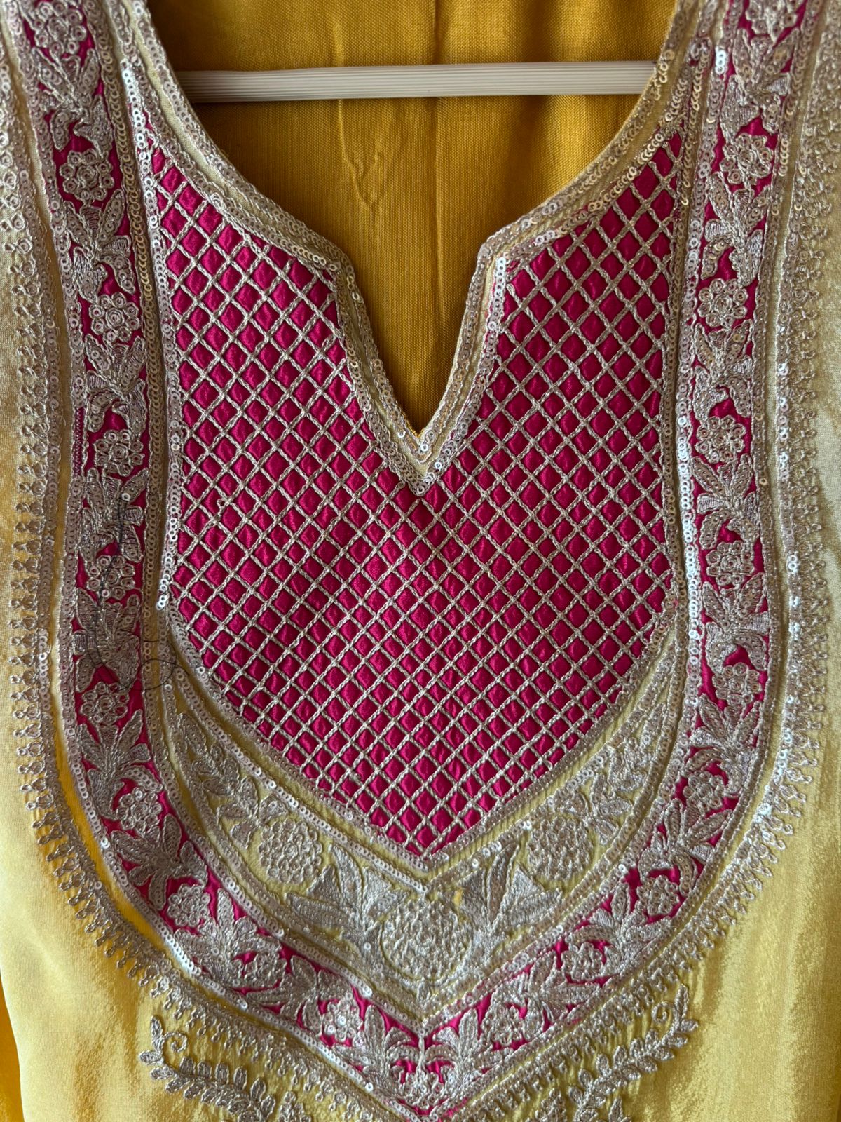 Traditional suit with heavy embellishment
