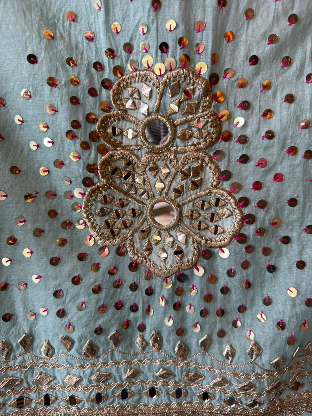 Heavily embellished traditional suit