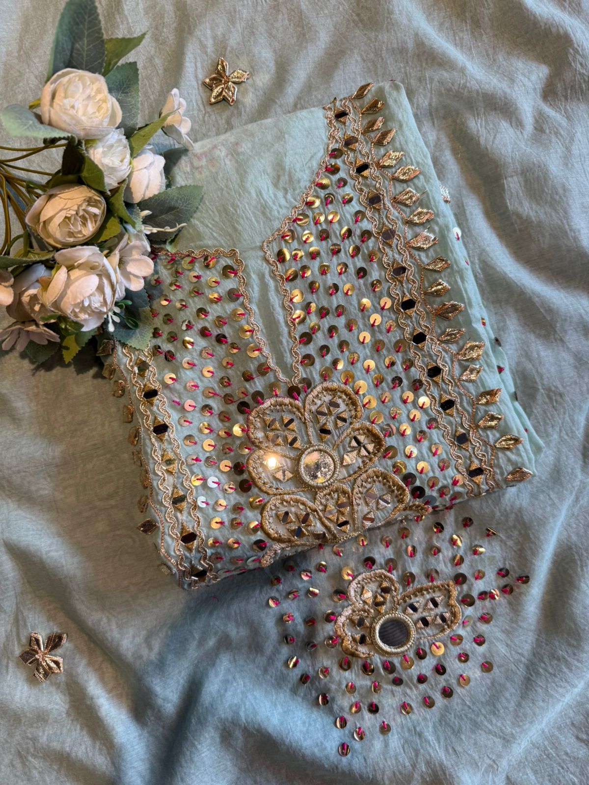 Heavily embellished traditional suit