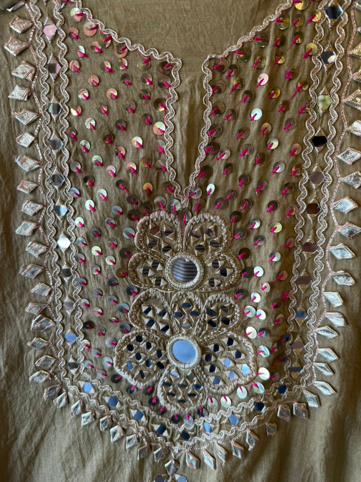 Heavily embellished traditional suit