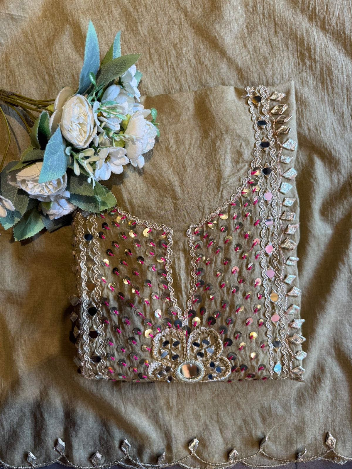 Heavily embellished traditional suit