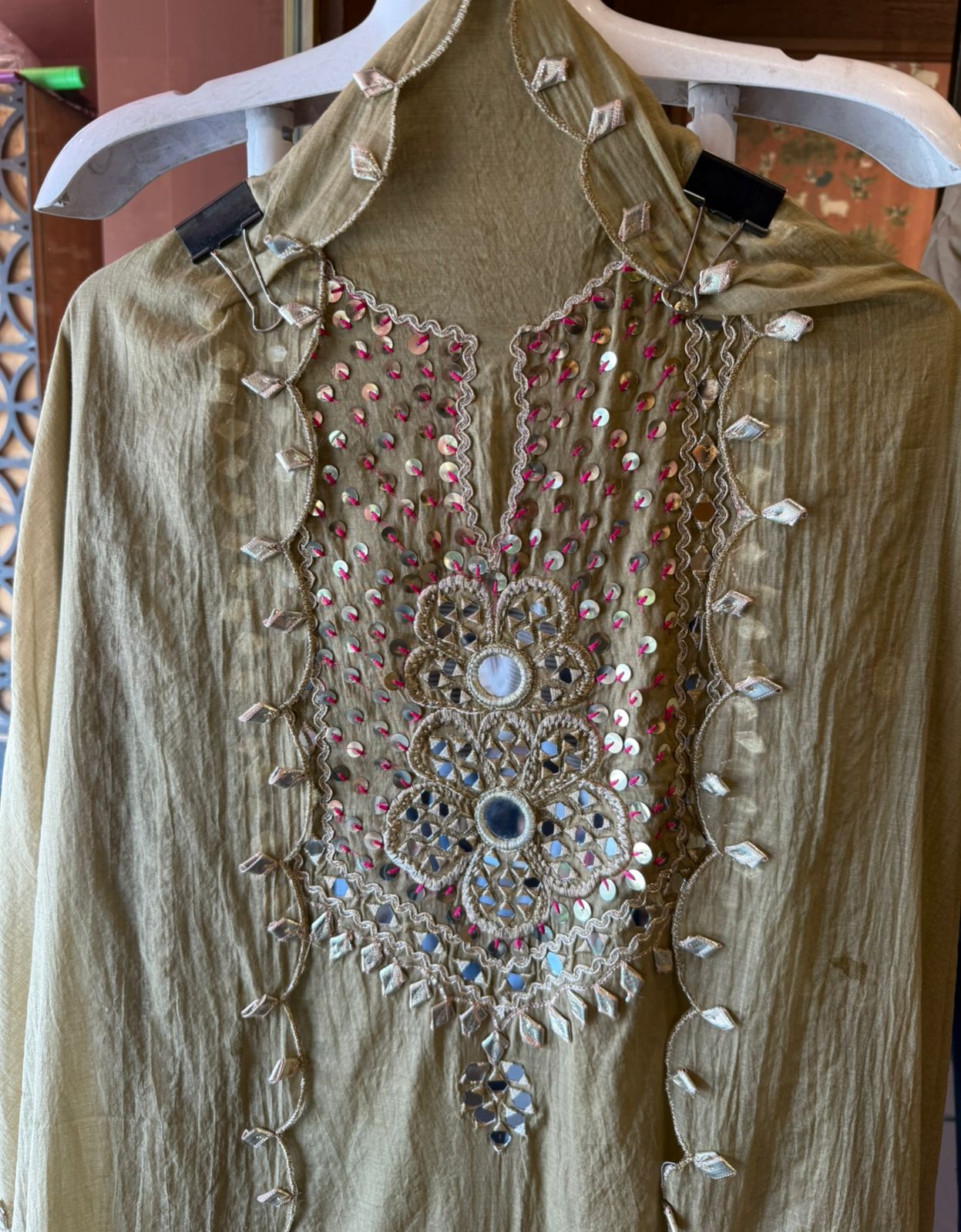 Heavily embellished traditional suit