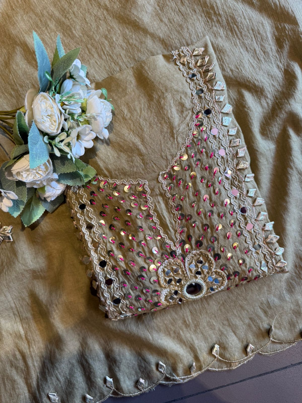 Heavily embellished traditional suit