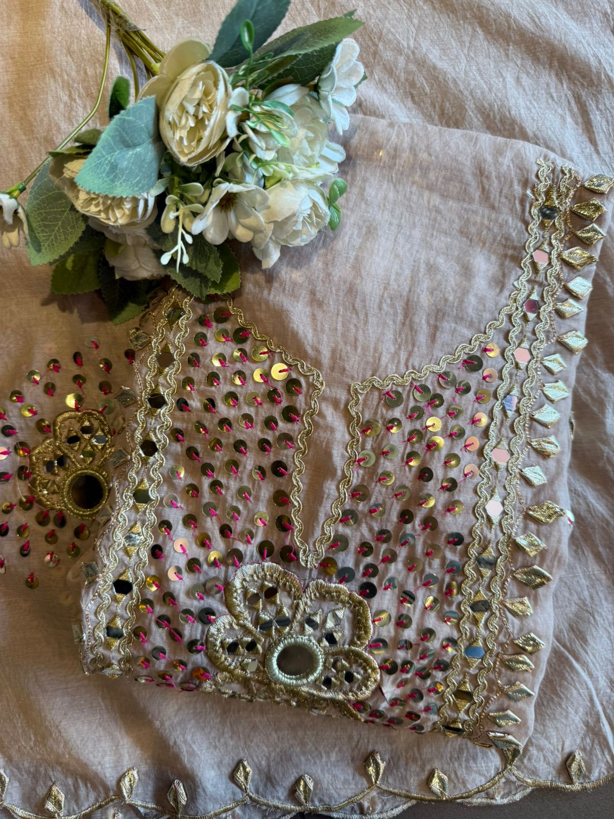 Heavily embellished traditional suit