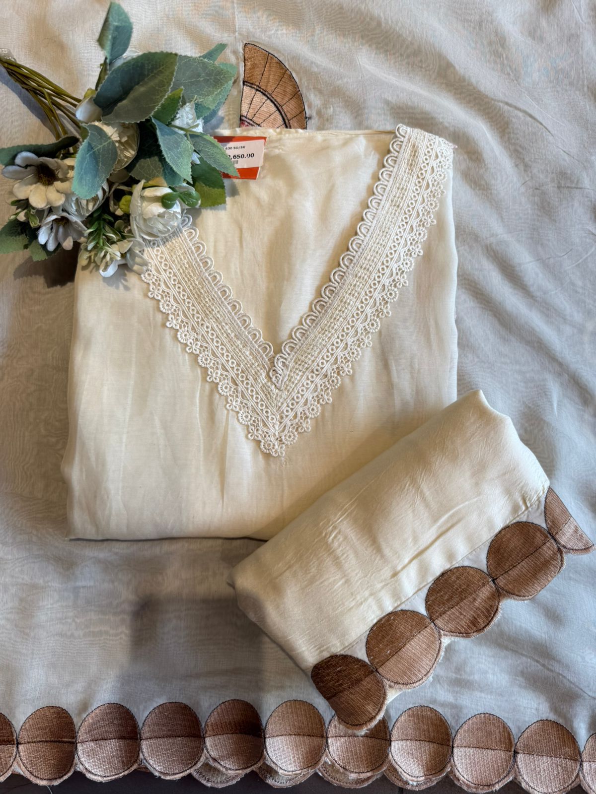 Beautiful unstitched Suit with Bird Motif Appliqué & Textured Detailing