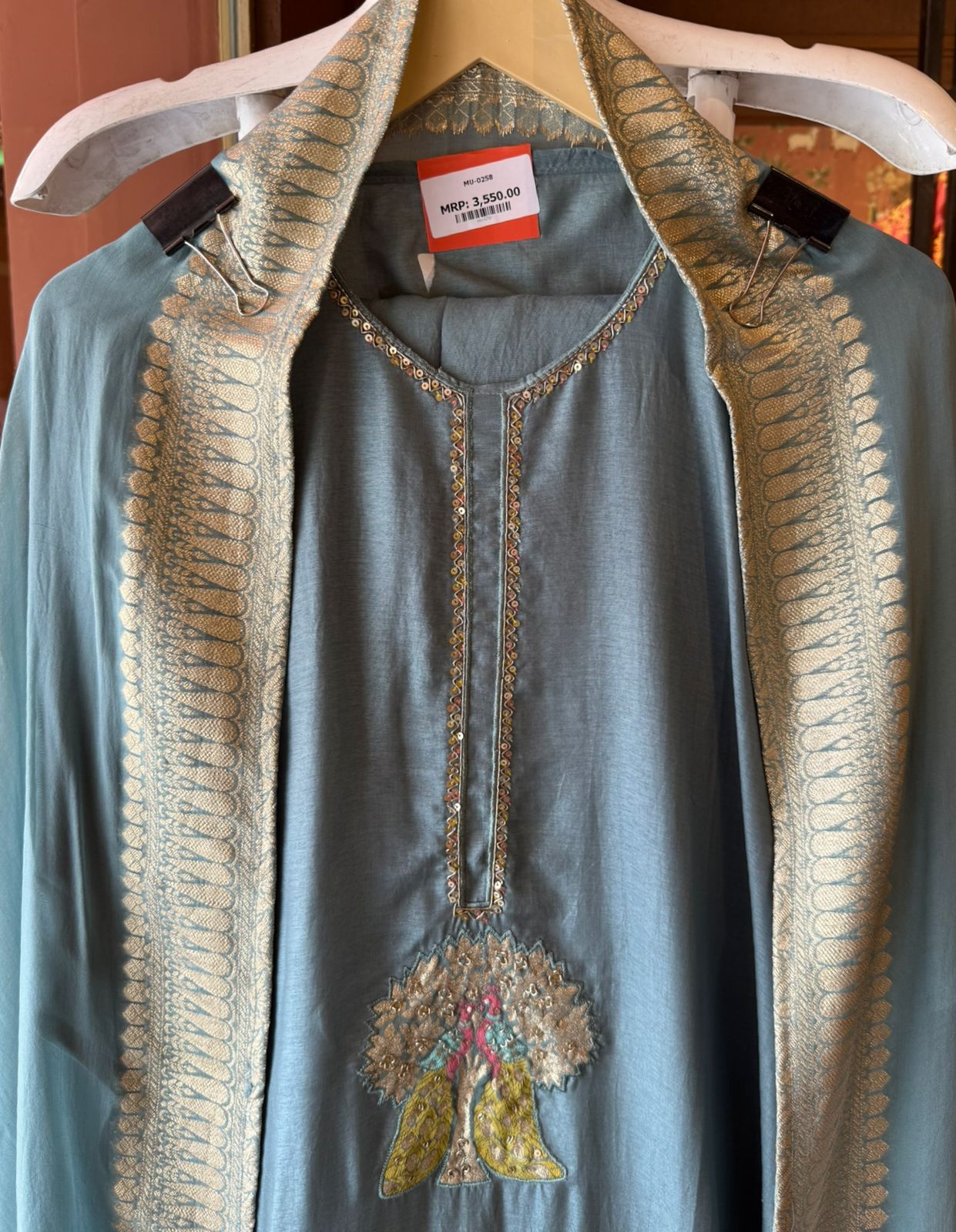 Silk with Smooth soft sheen and structured fall