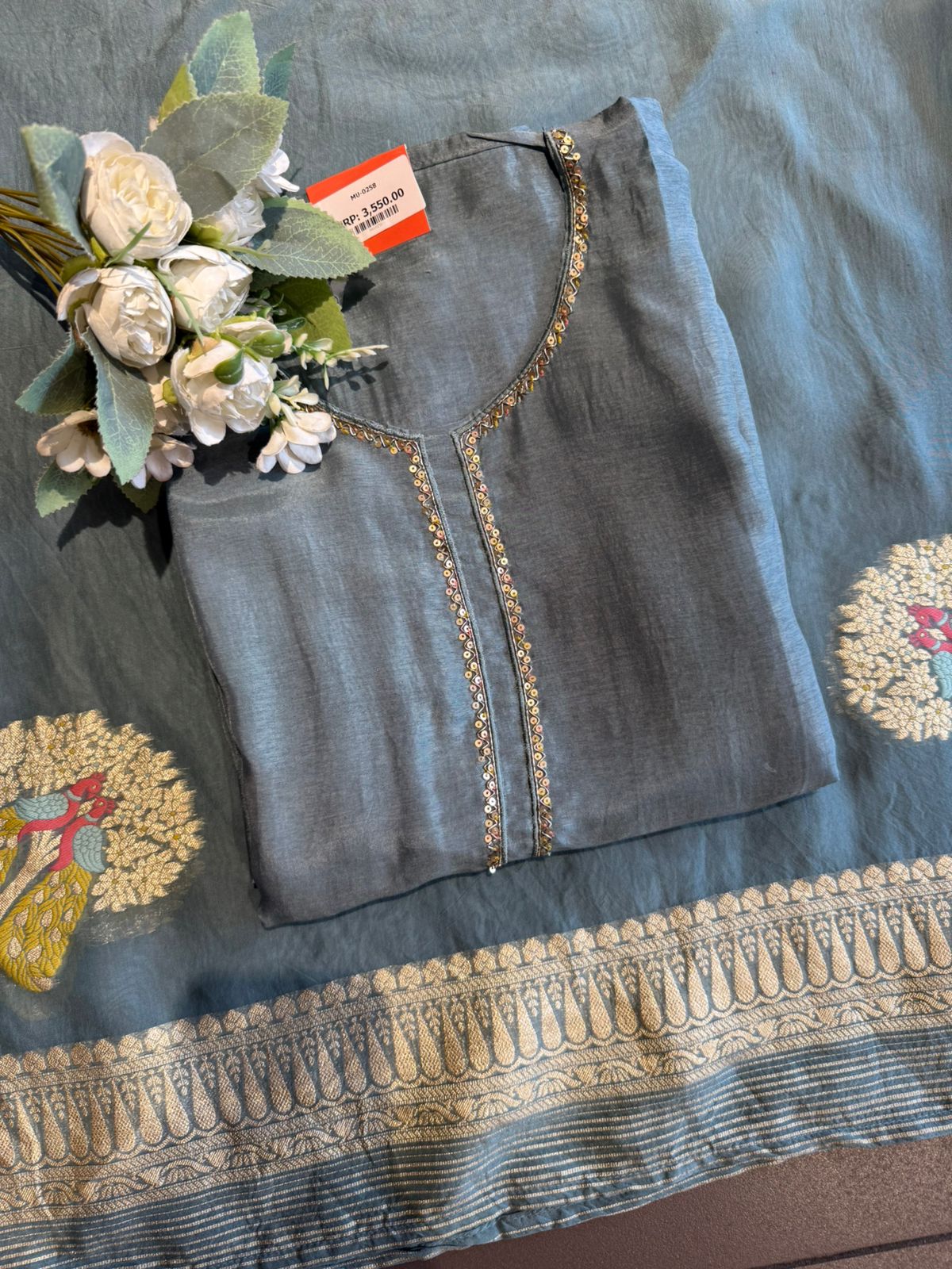 Silk with Smooth soft sheen and structured fall