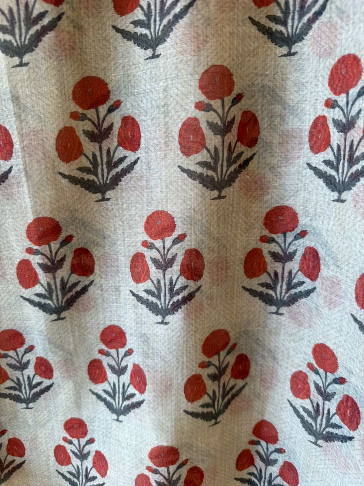 Soft beige base with all-over floral handblock print