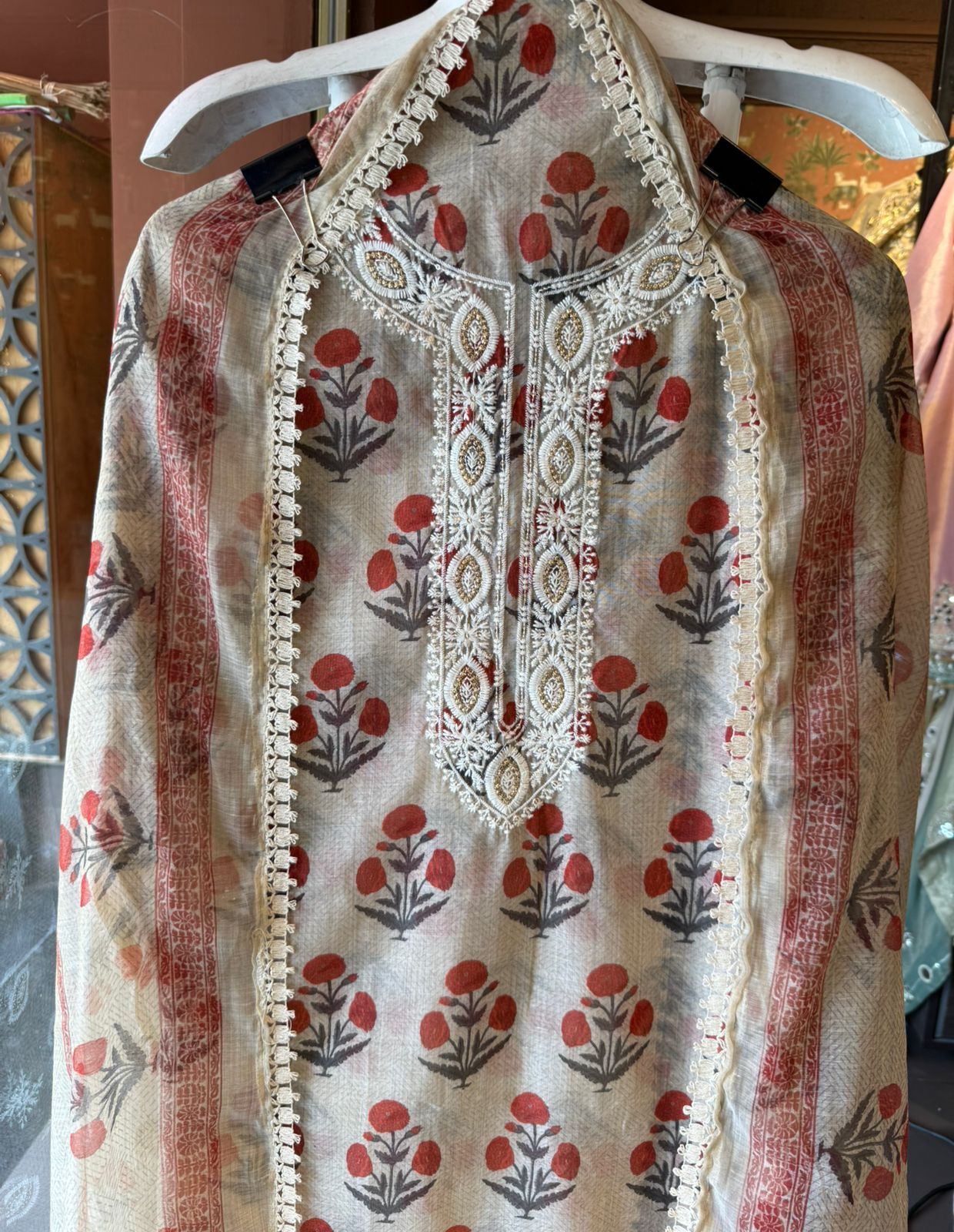 Soft beige base with all-over floral handblock print