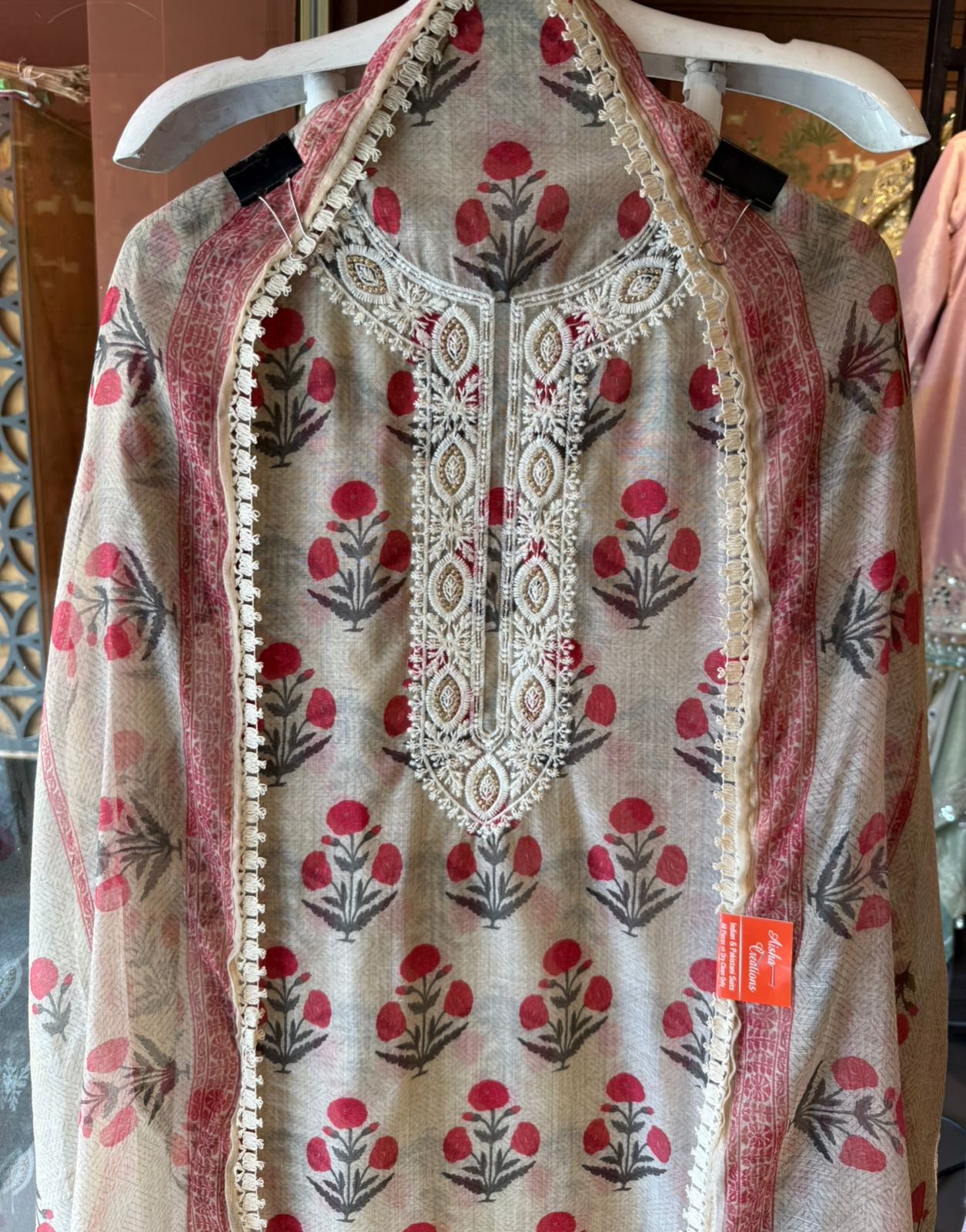 Soft beige base with all-over floral handblock print