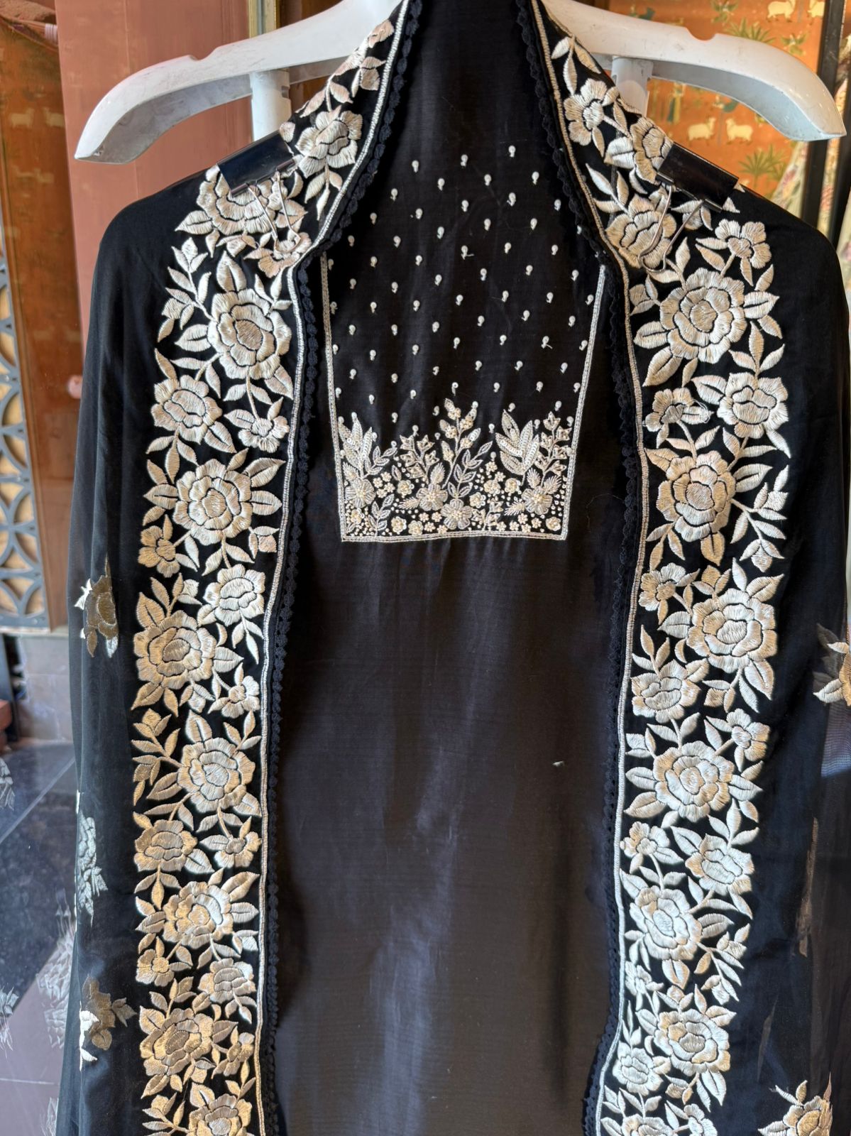 Timeless outfit elevated with white thread floral embroidery