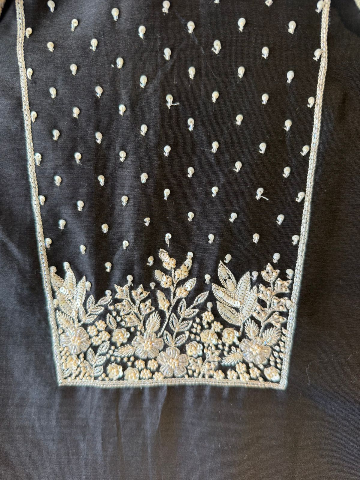 Timeless outfit elevated with white thread floral embroidery