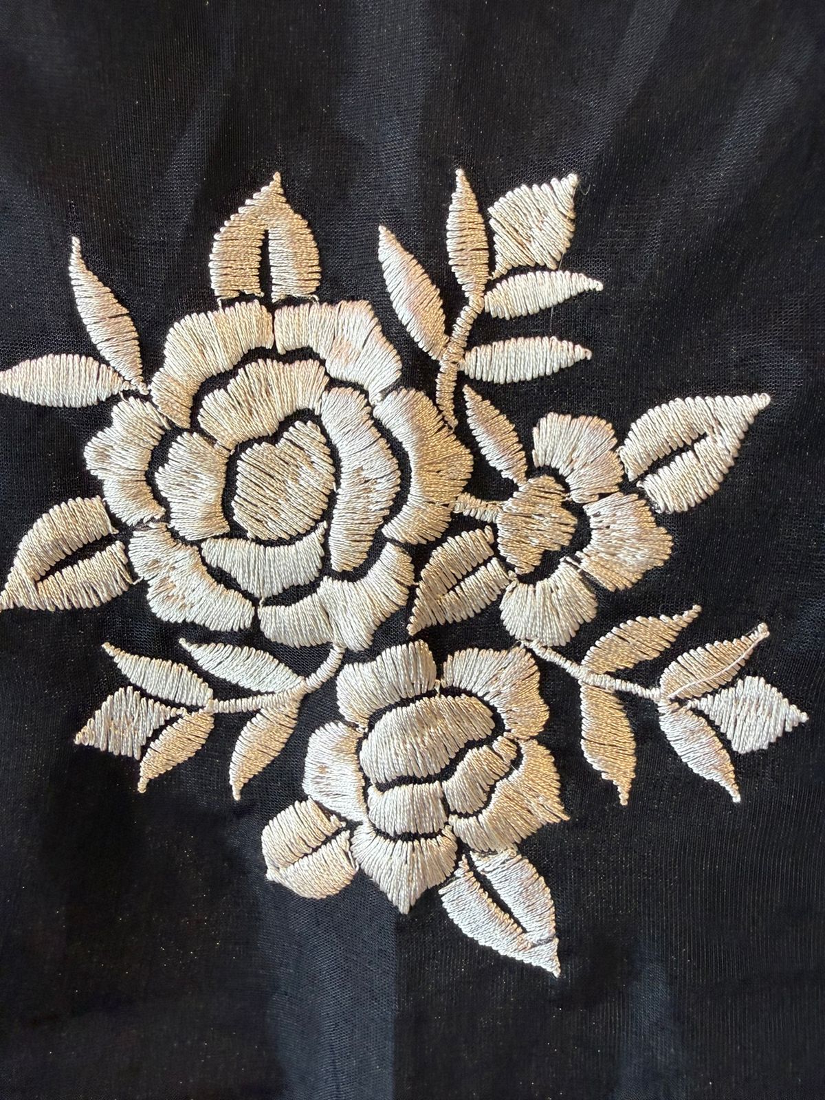 Timeless outfit elevated with white thread floral embroidery