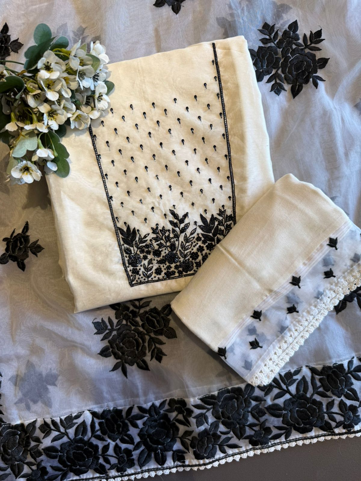 Timeless outfit elevated with white thread floral embroidery