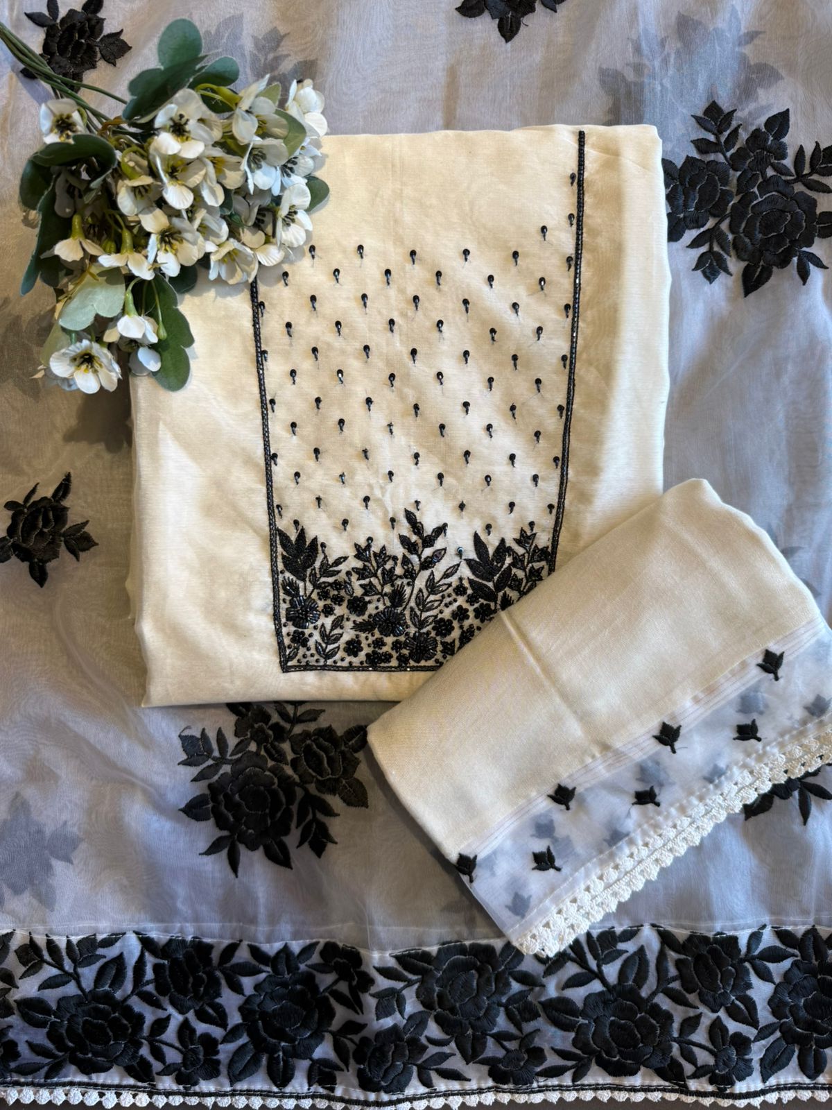 Timeless outfit elevated with white thread floral embroidery