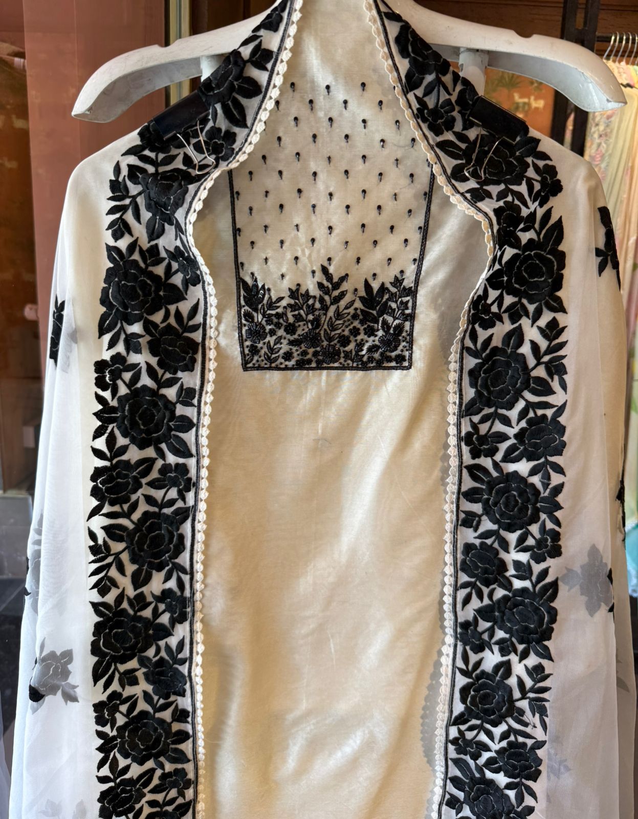 Timeless outfit elevated with white thread floral embroidery