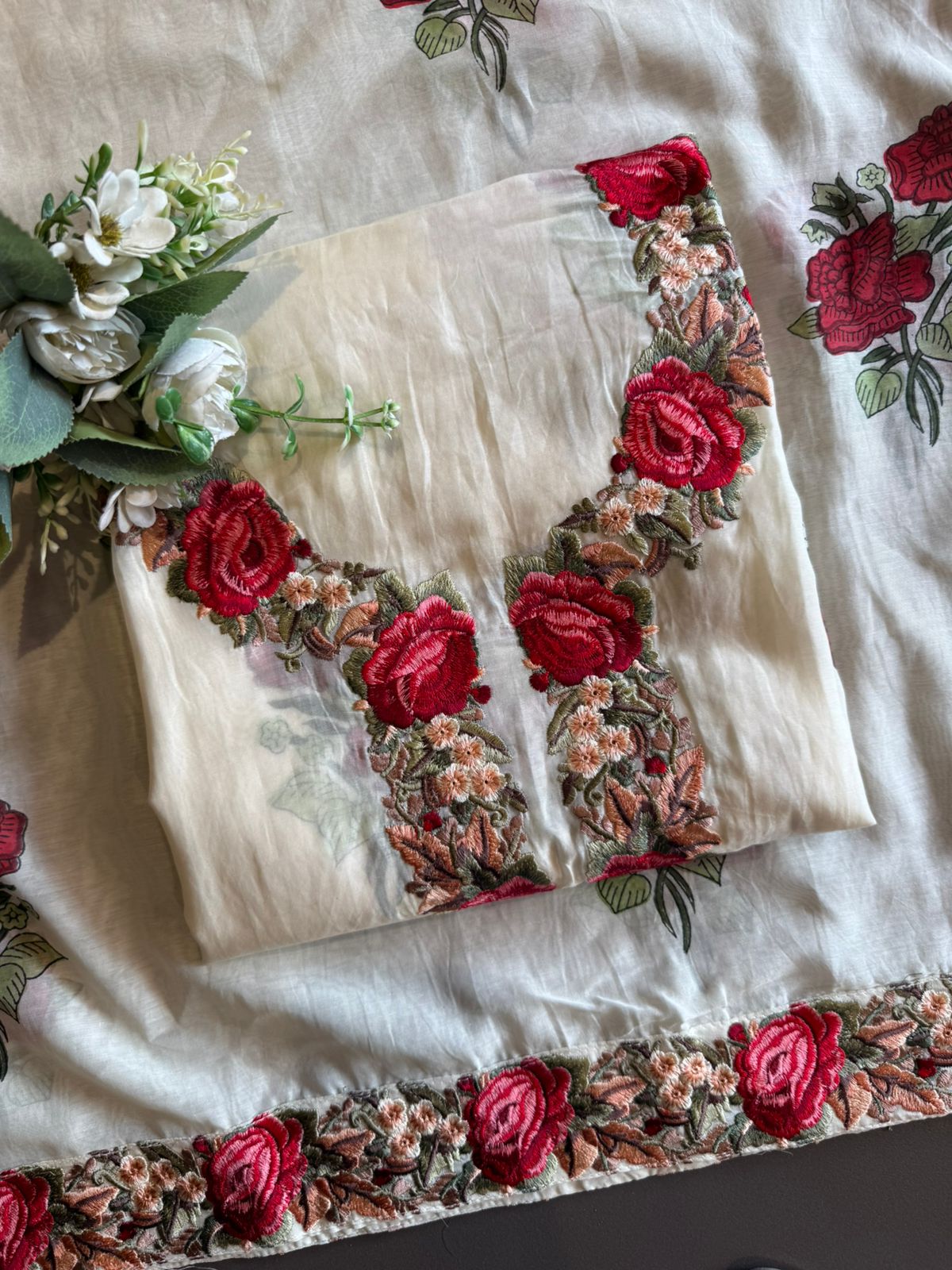 Elegant ensemble elevated with statement red rose embroidery