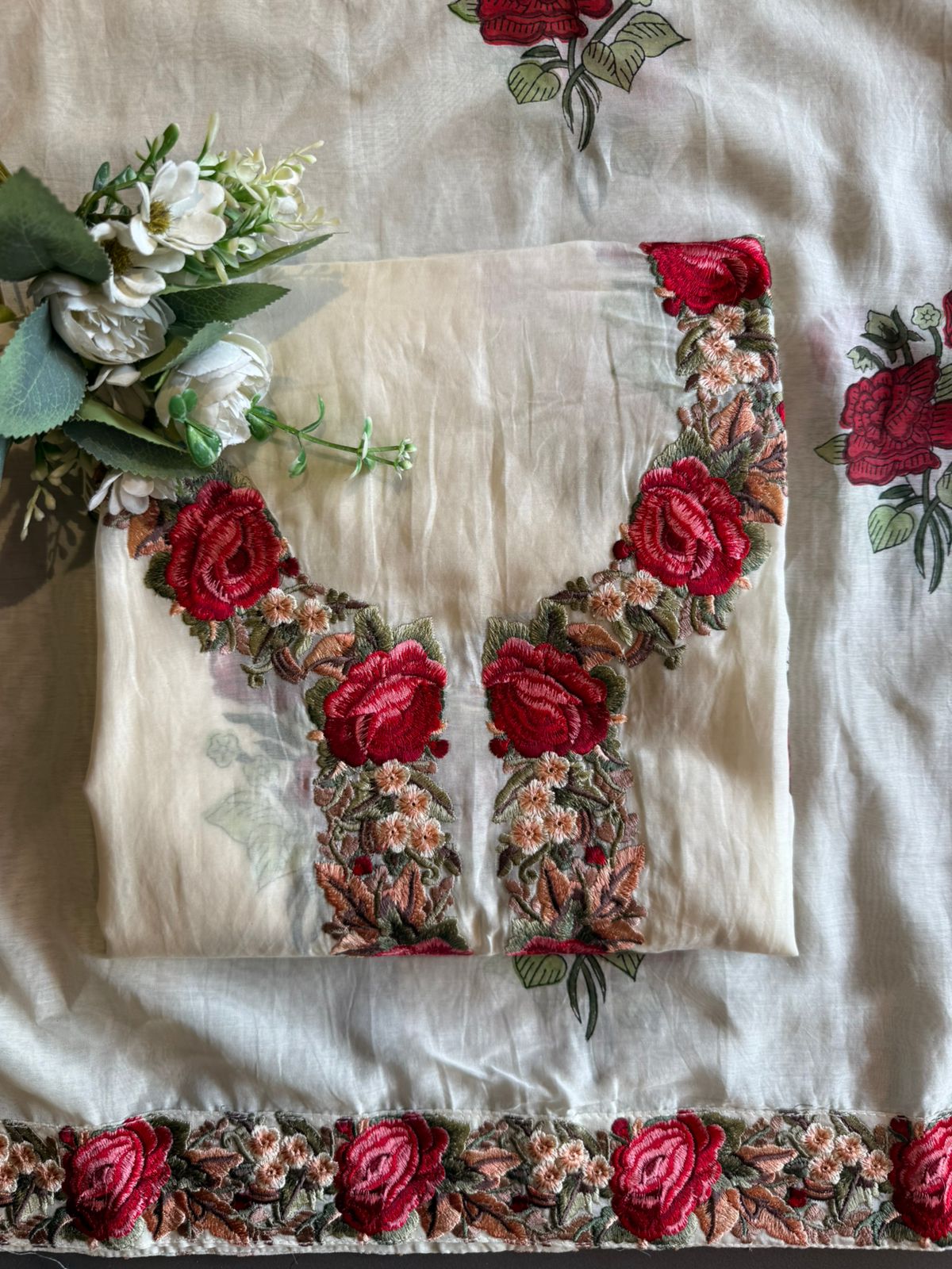 Elegant ensemble elevated with statement red rose embroidery