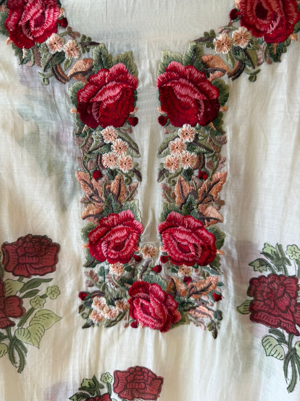 Elegant ensemble elevated with statement red rose embroidery
