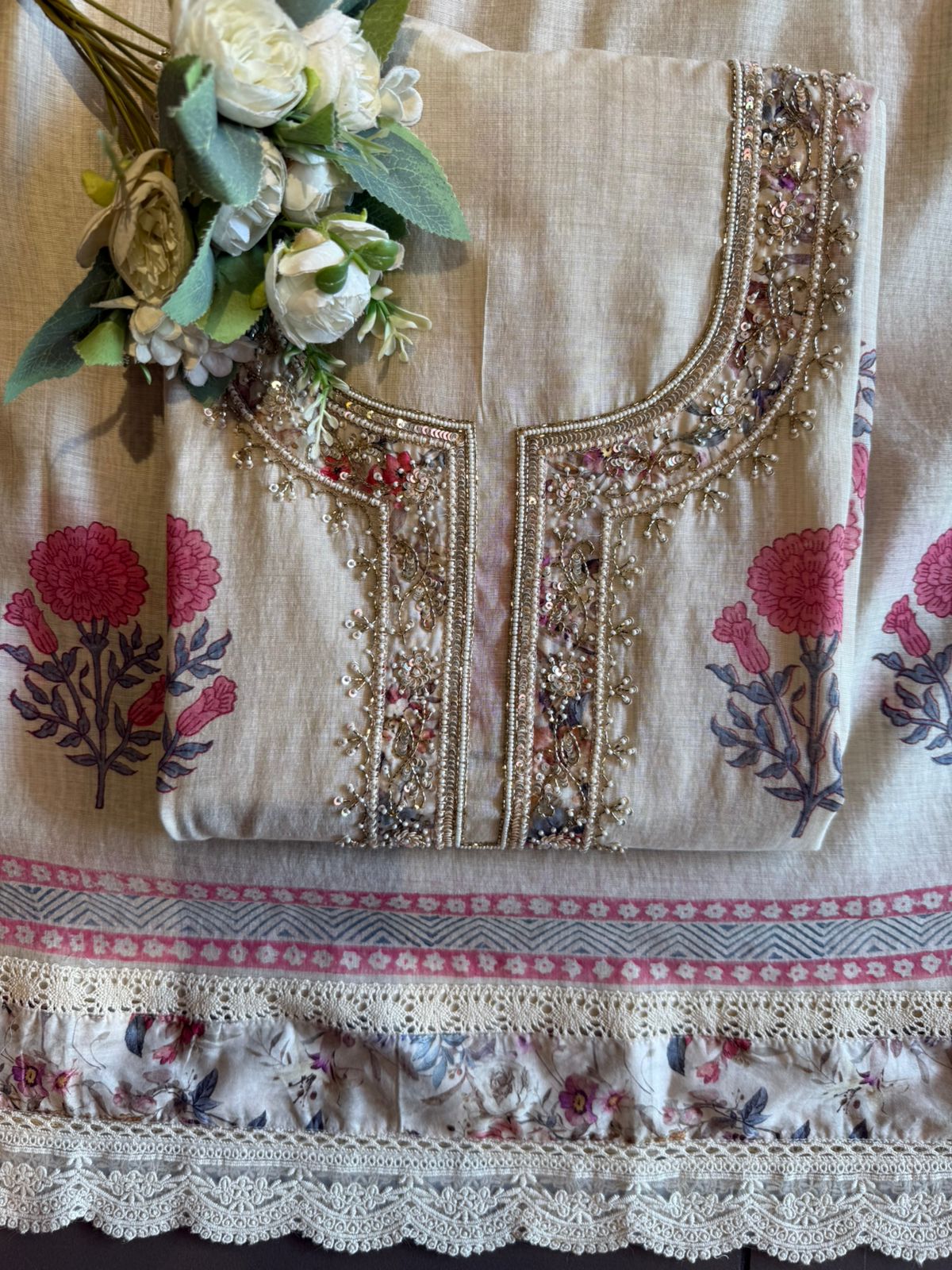 Graceful ivory-toned suit