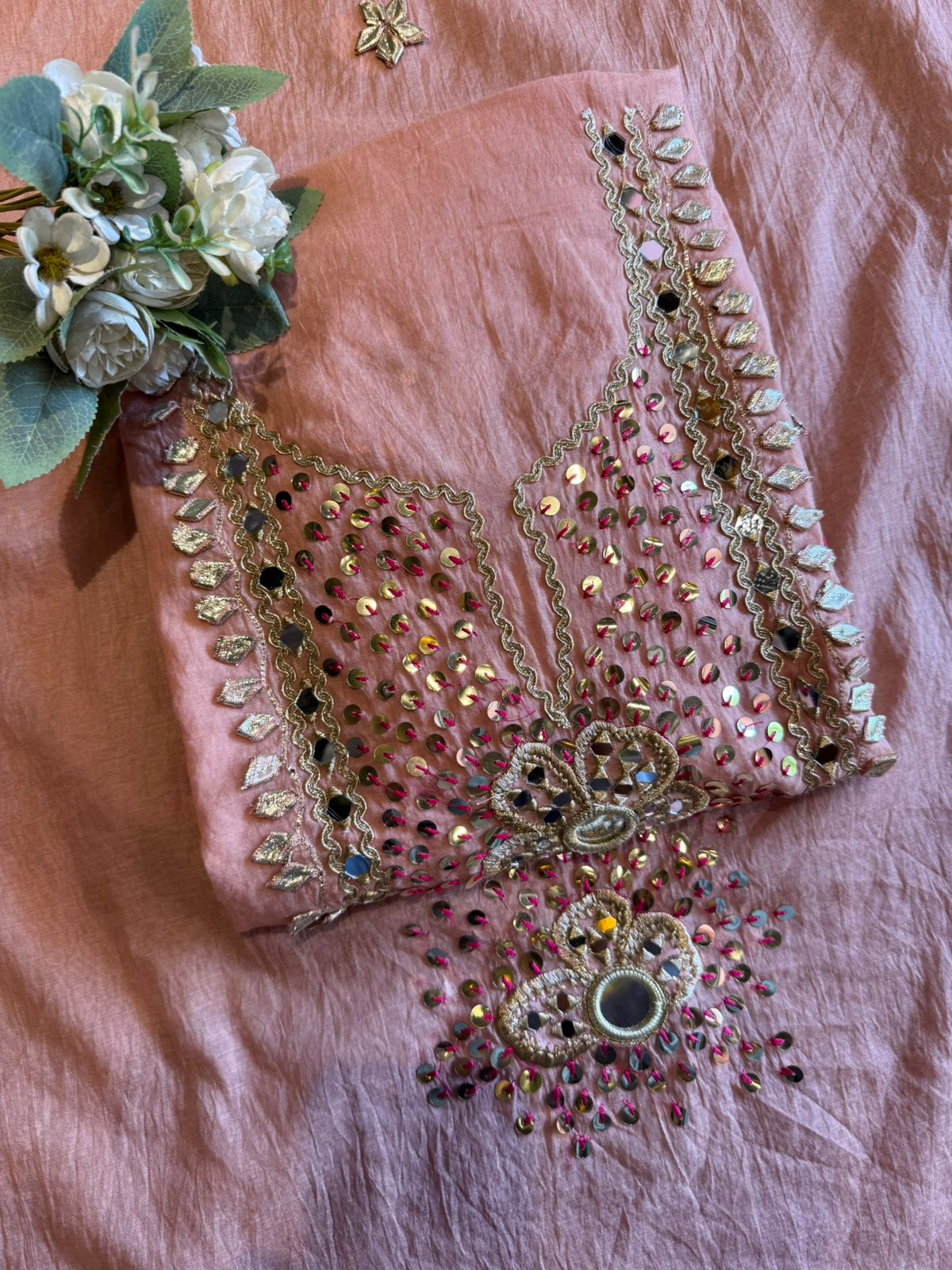 Heavily embellished traditional suit