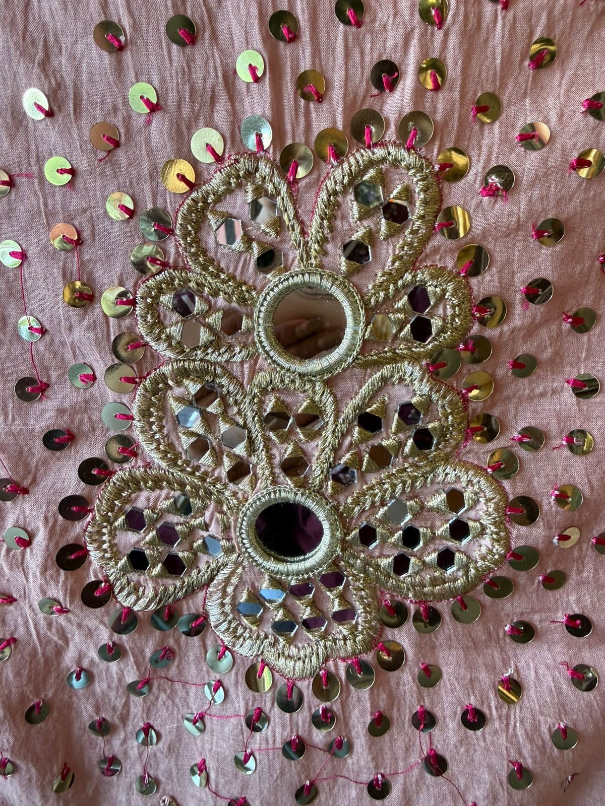 Heavily embellished traditional suit