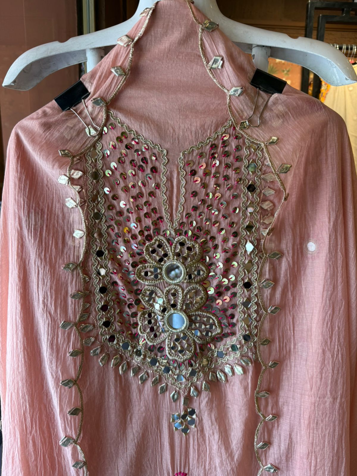 Heavily embellished traditional suit