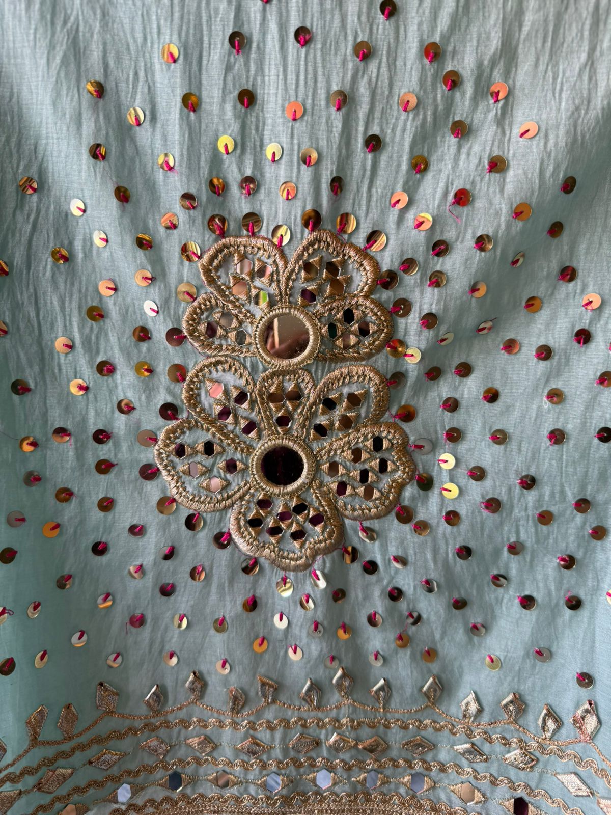 Heavily embellished traditional suit