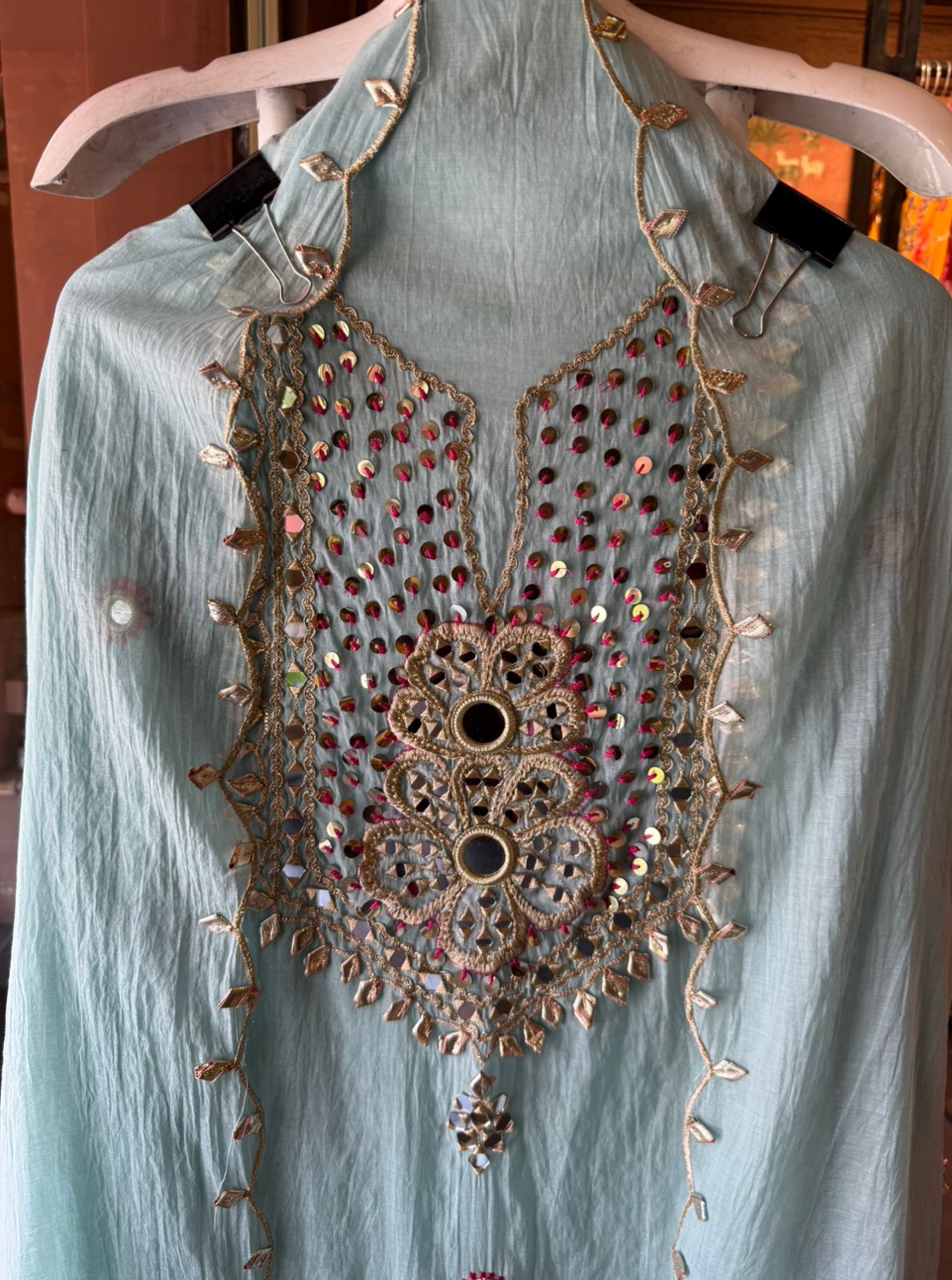 Heavily embellished traditional suit