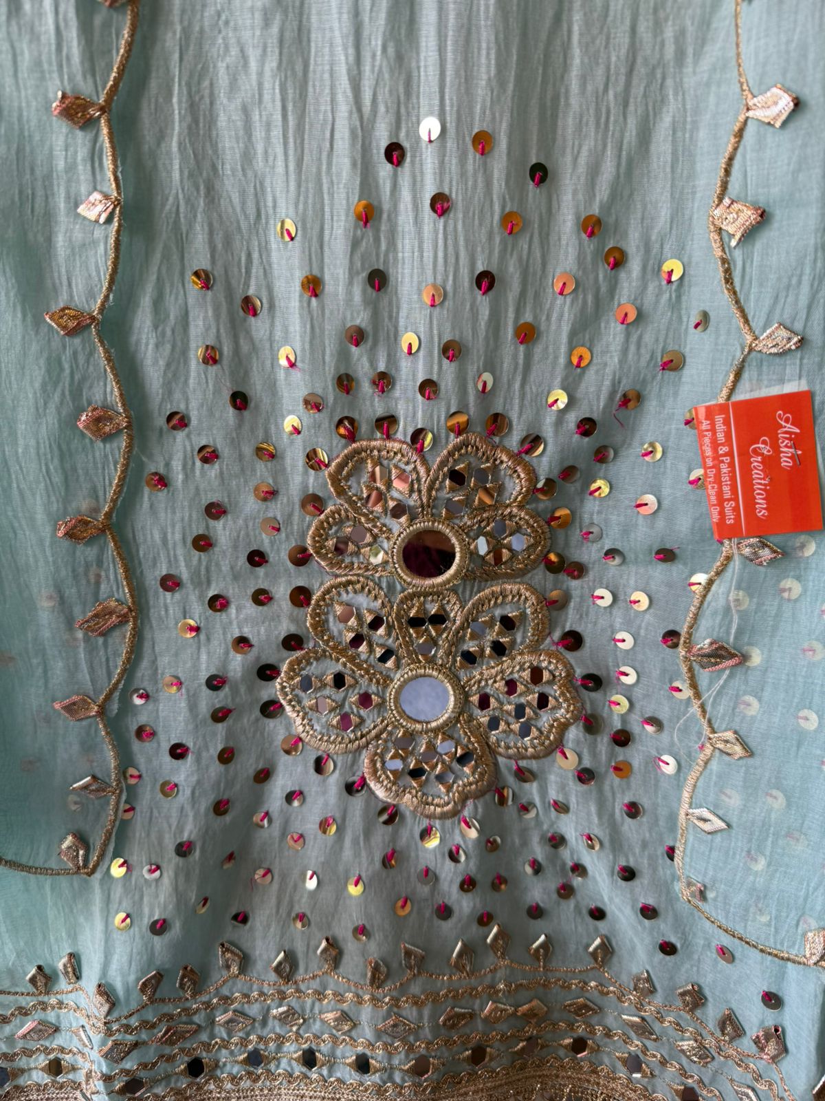 Heavily embellished traditional suit
