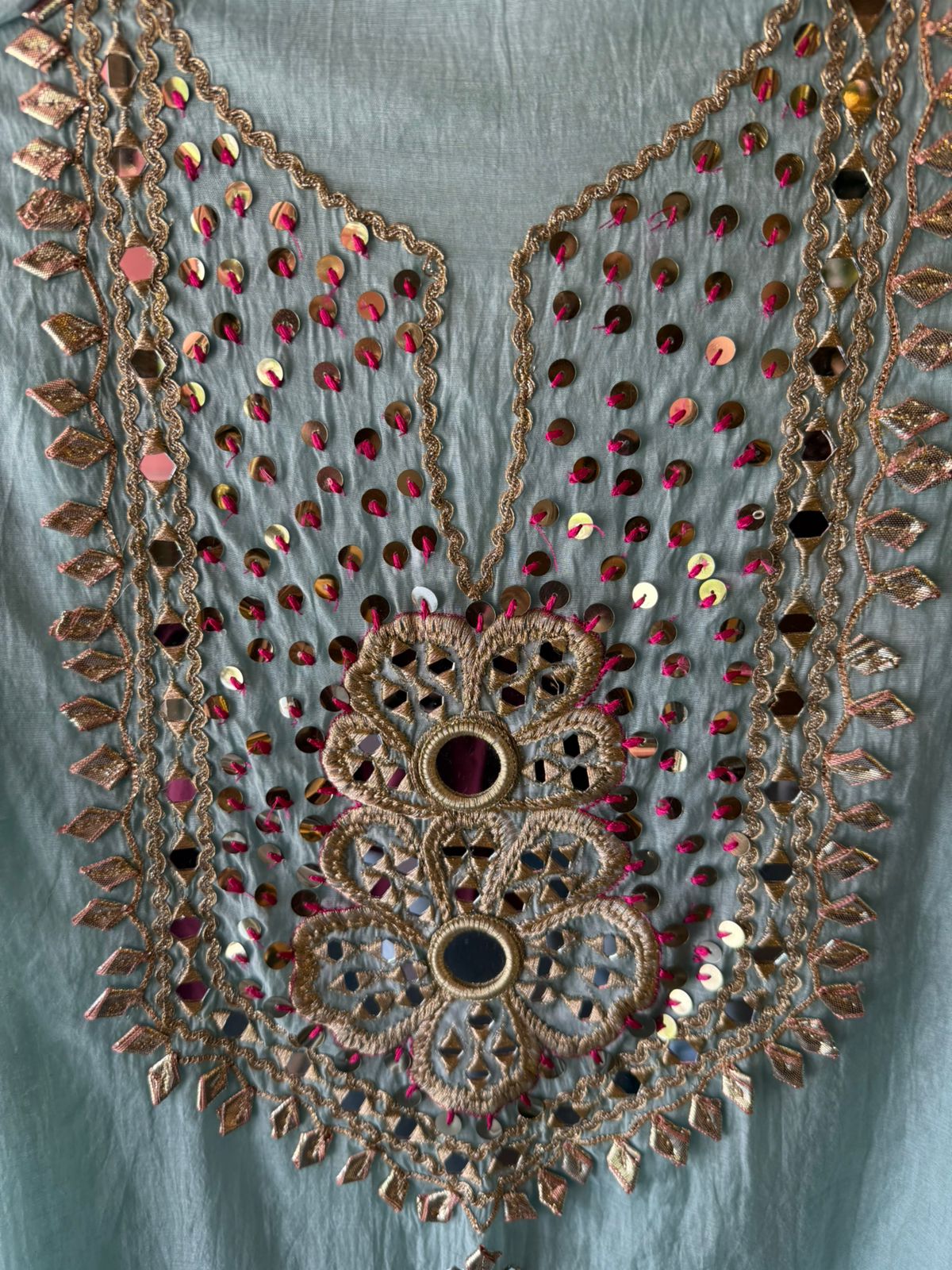 Heavily embellished traditional suit