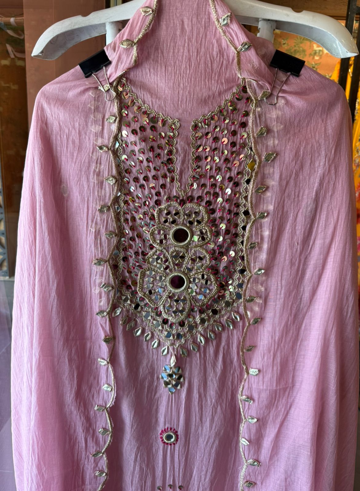 Heavily embellished traditional suit