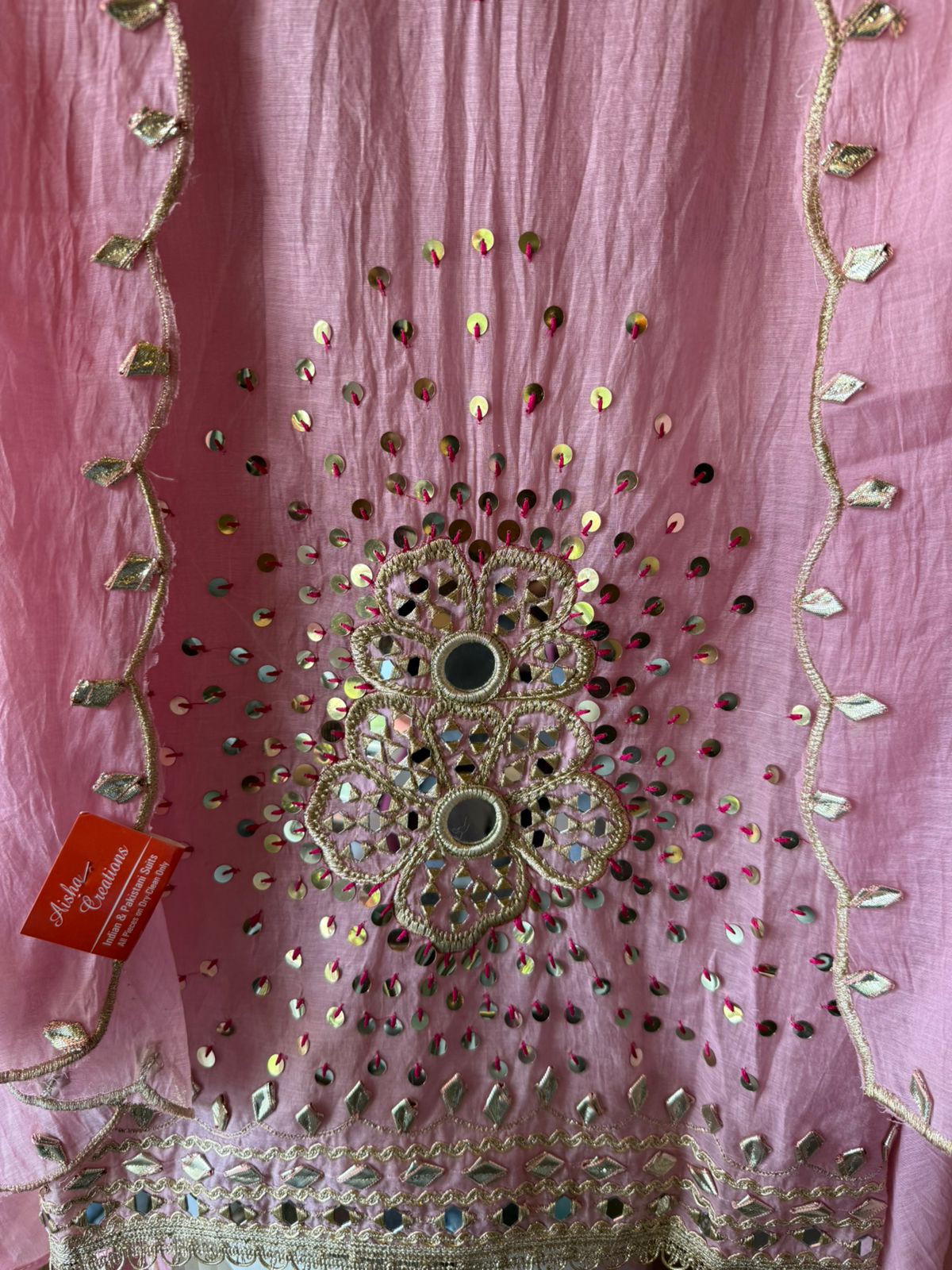 Heavily embellished traditional suit