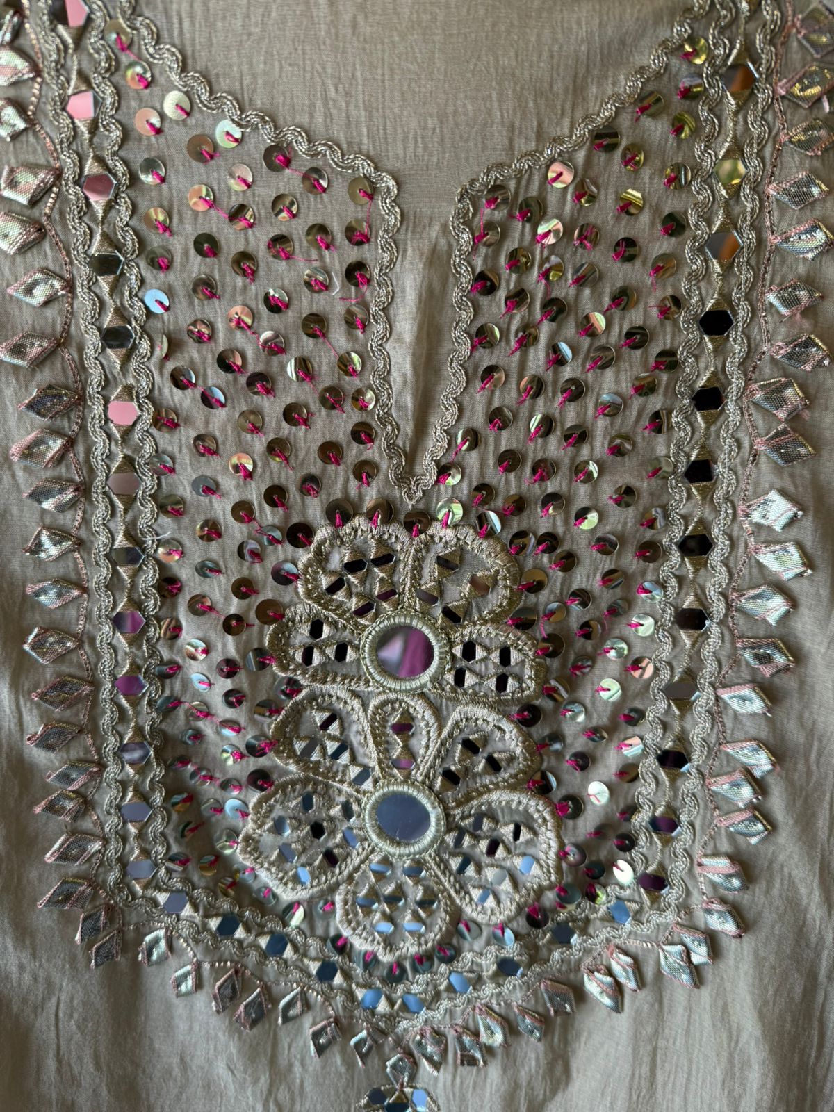 Heavily embellished traditional suit