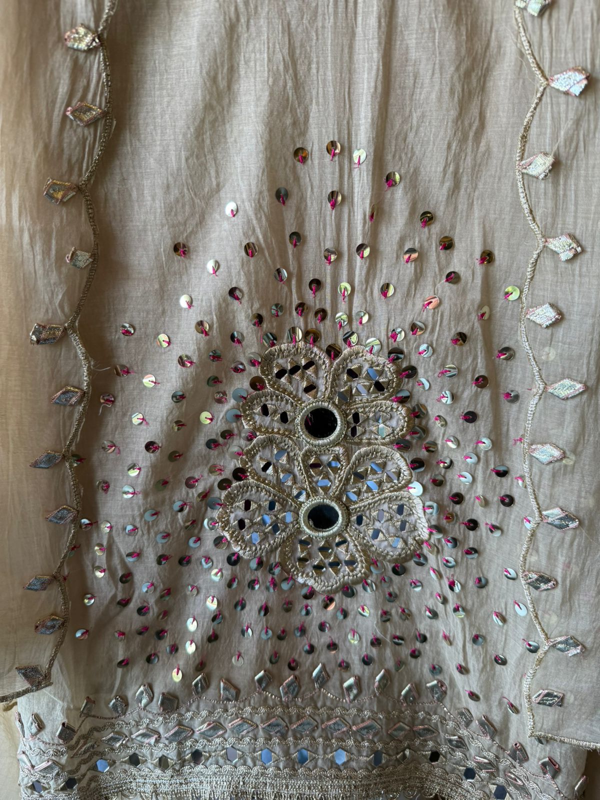 Heavily embellished traditional suit