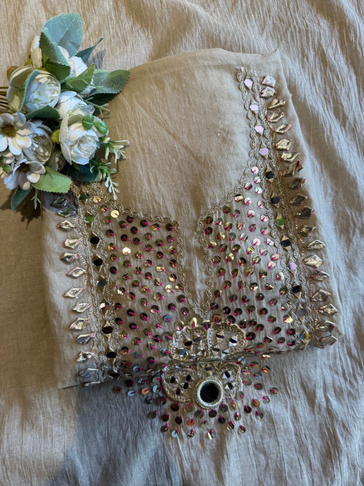 Heavily embellished traditional suit